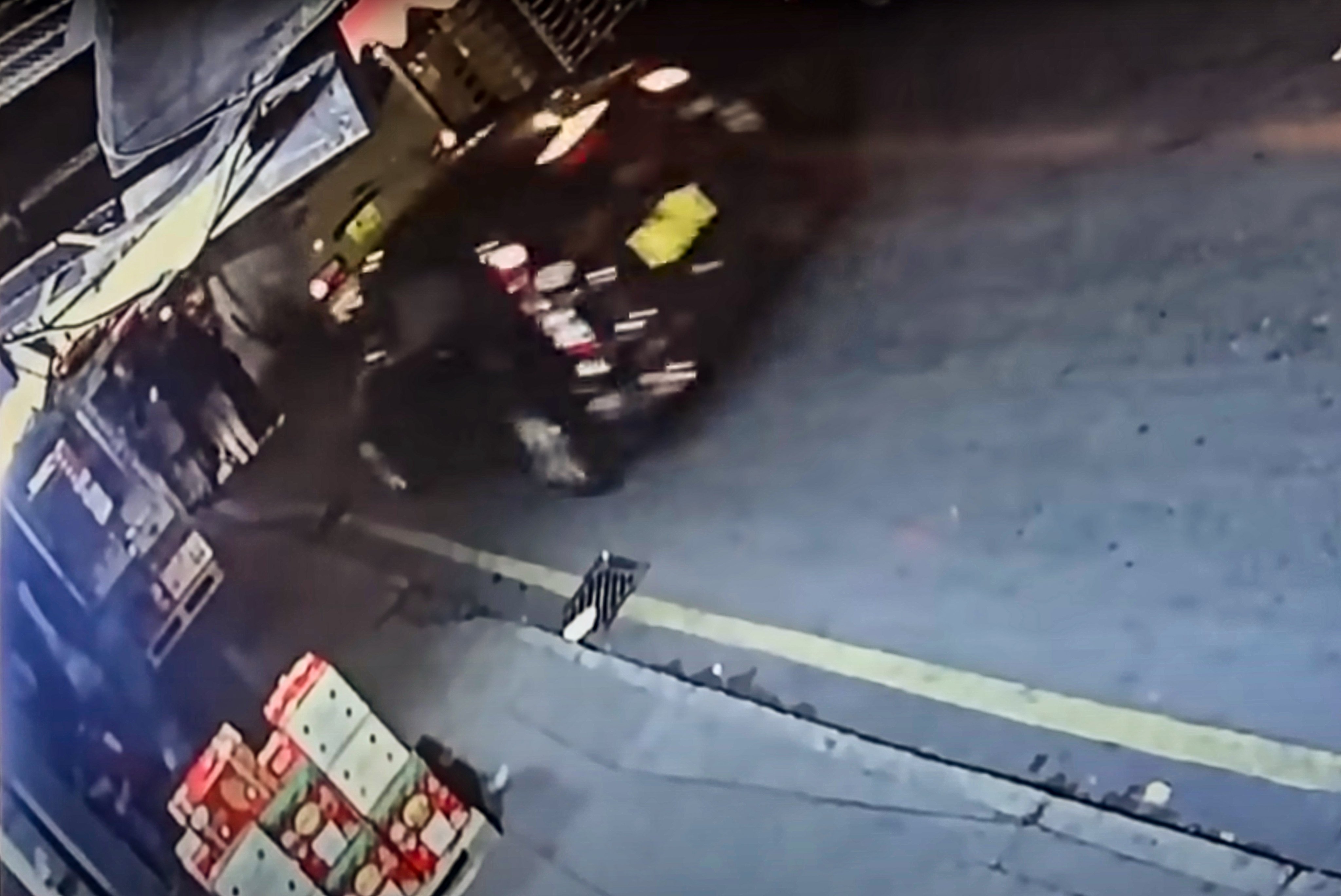 A screengrab of CCTV footage showing the black vehicle just before the incident near the Yau Ma Tei Fruit Market. Photo: Handout