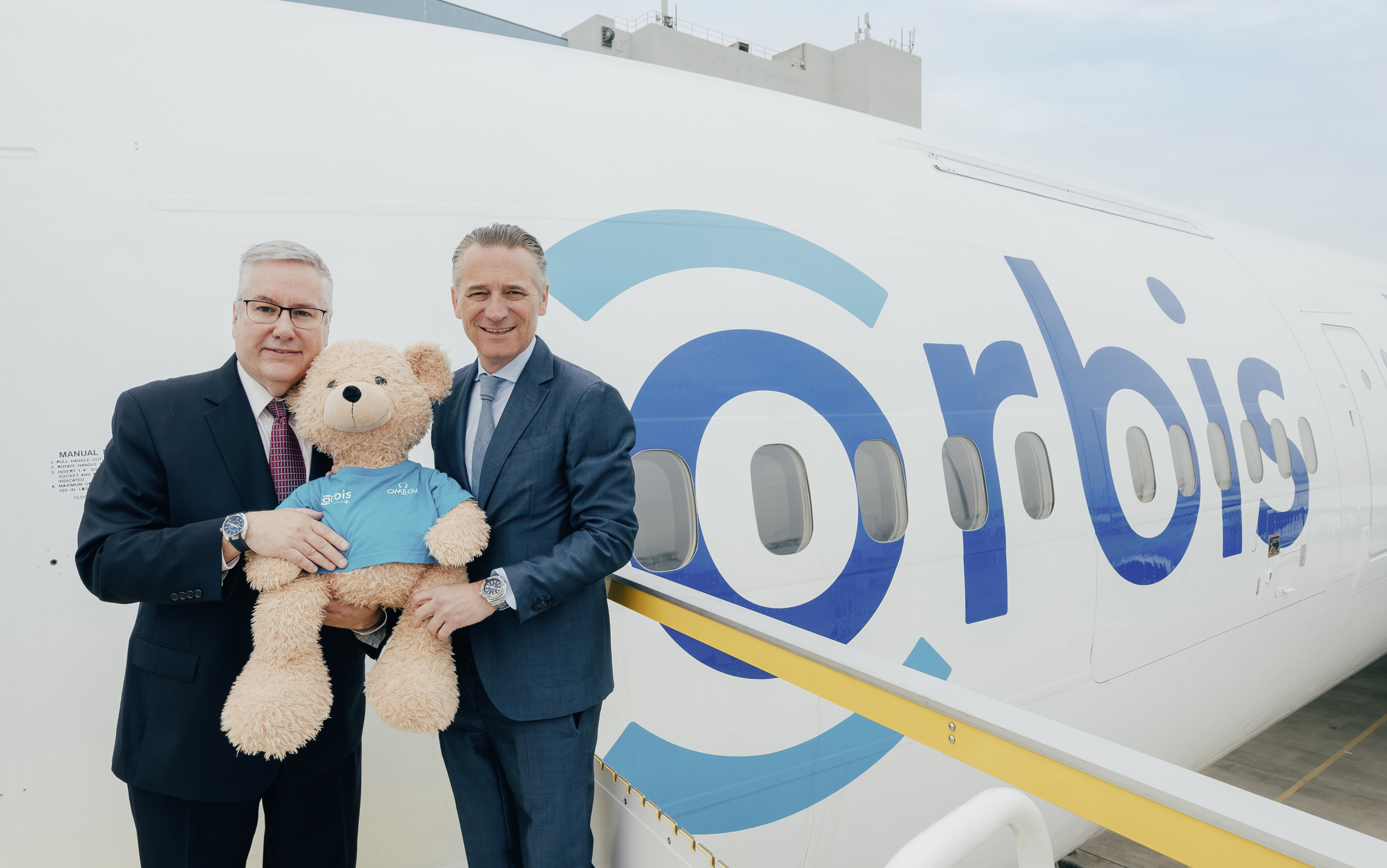 Orbis president and CEO Derek Hodkey (left) with Omega CEO and president Raynald Aeschlimann. Omega supports the flying eye hospital through its CSR initiative. Photo: Handout