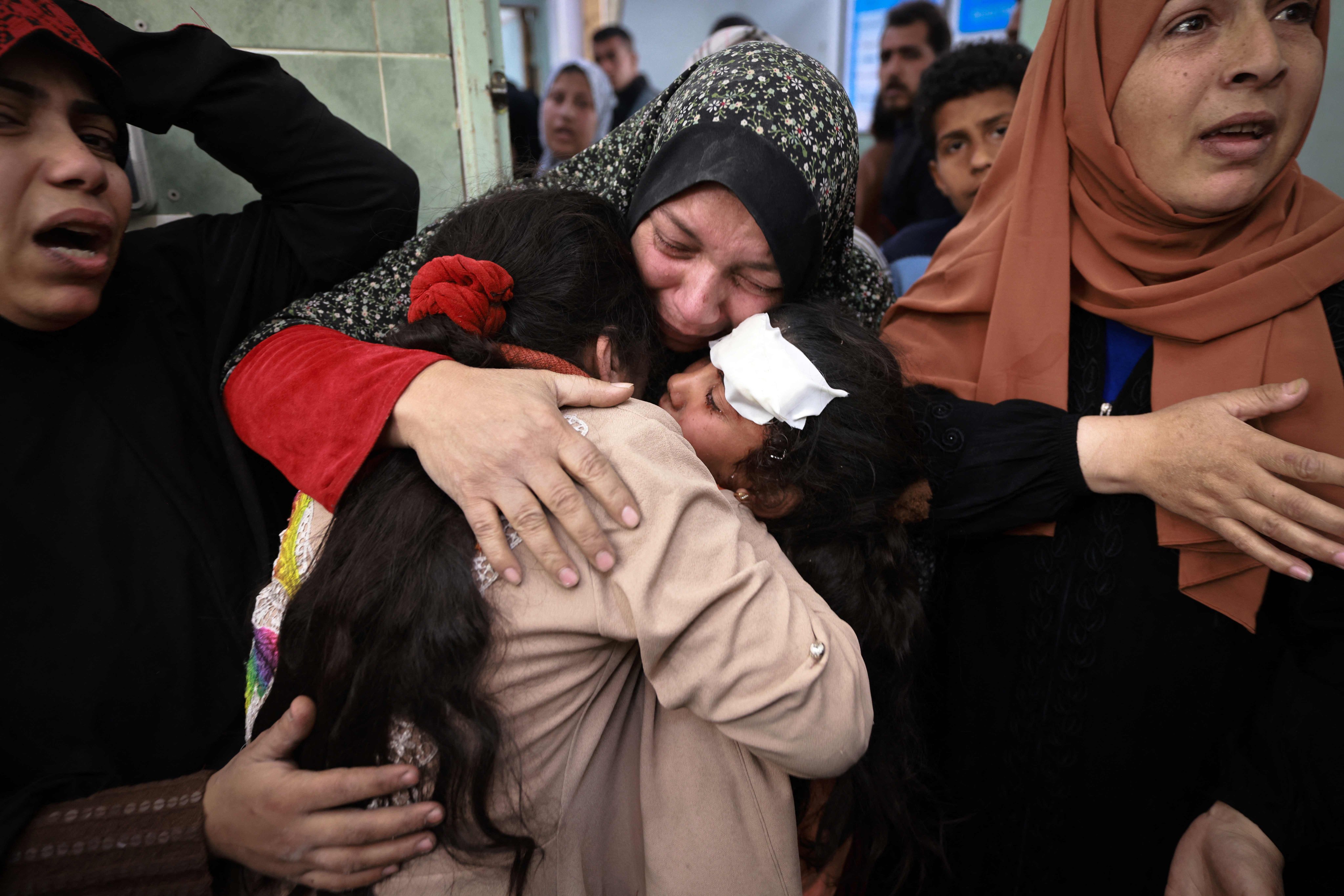 Palestinian women mourn relatives killed in Israeli bombardment at the al-Najjar hospital in Rafah on Friday. Photo: AFP