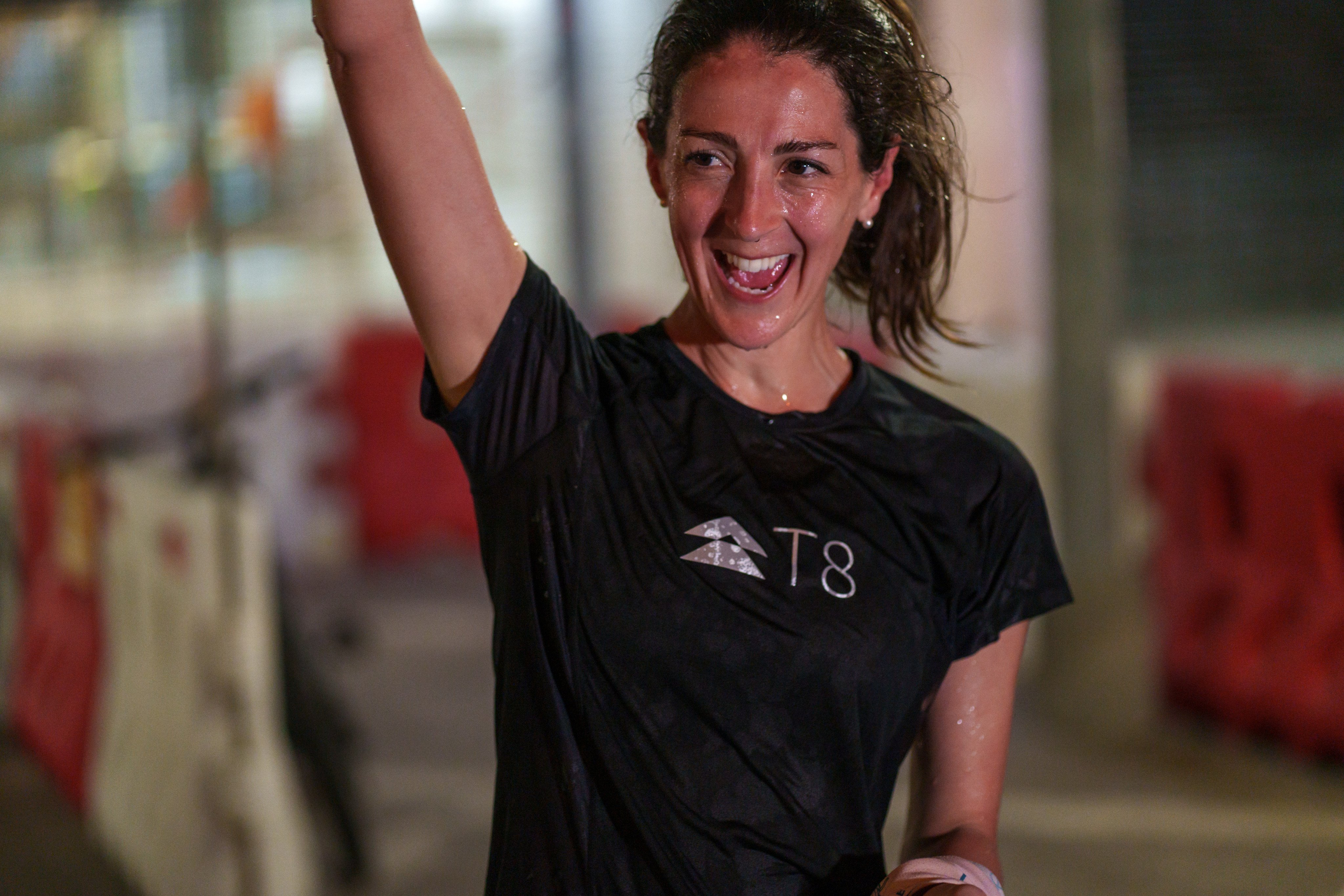 Alice McLeod celebrates crossing the finish line of the 2024 Hong Kong Four Trails Ultra Challenge. Photo: Viola Shum