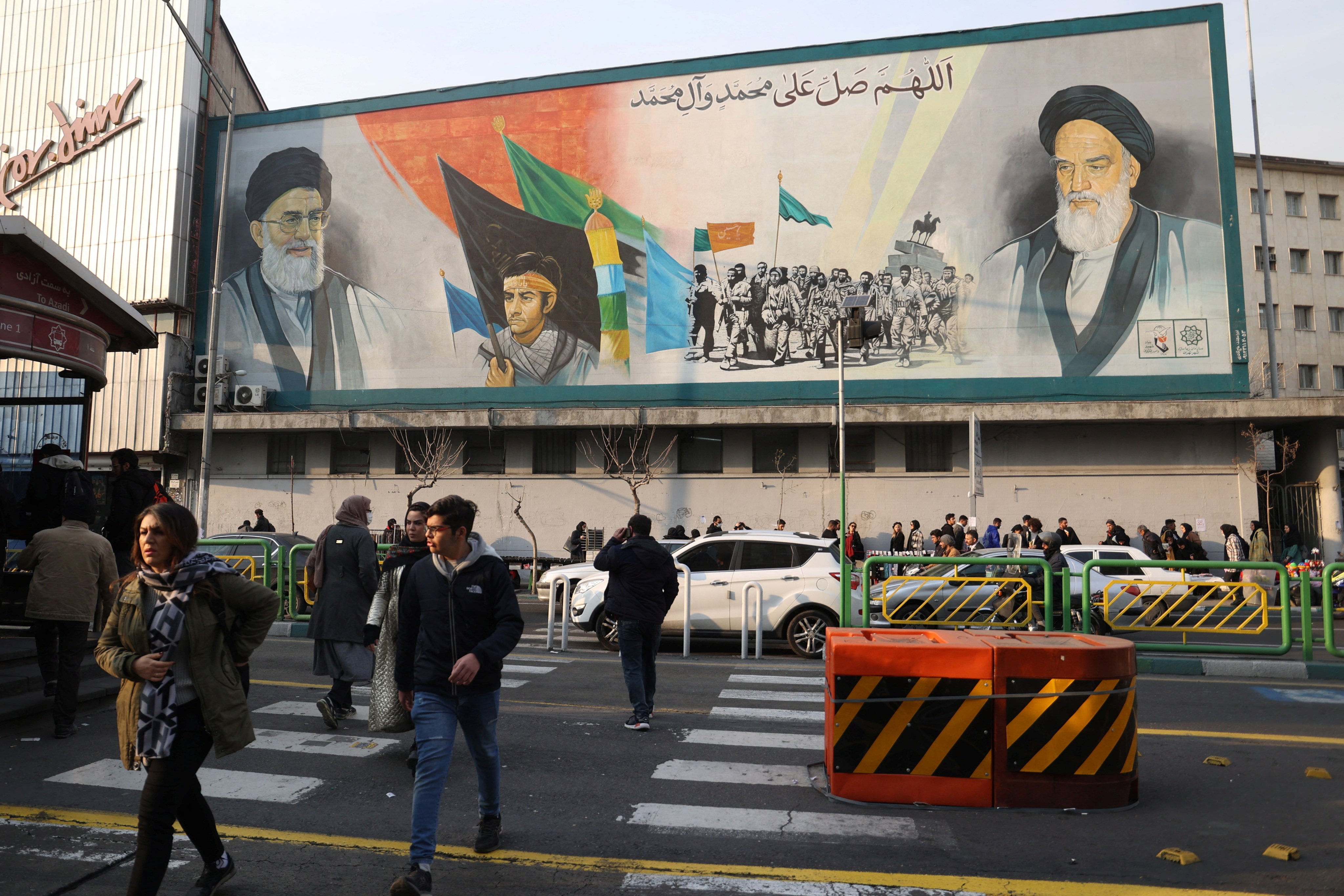 A mural in Tehran depicting the late leader of the Islamic Revolution Ayatollah Ruhollah Khomeini and Iran’s Supreme Leader Ayatollah Ali Khamenei. Photo: Majid Asgaripour / West Asia News Agency (WANA) via Reuters