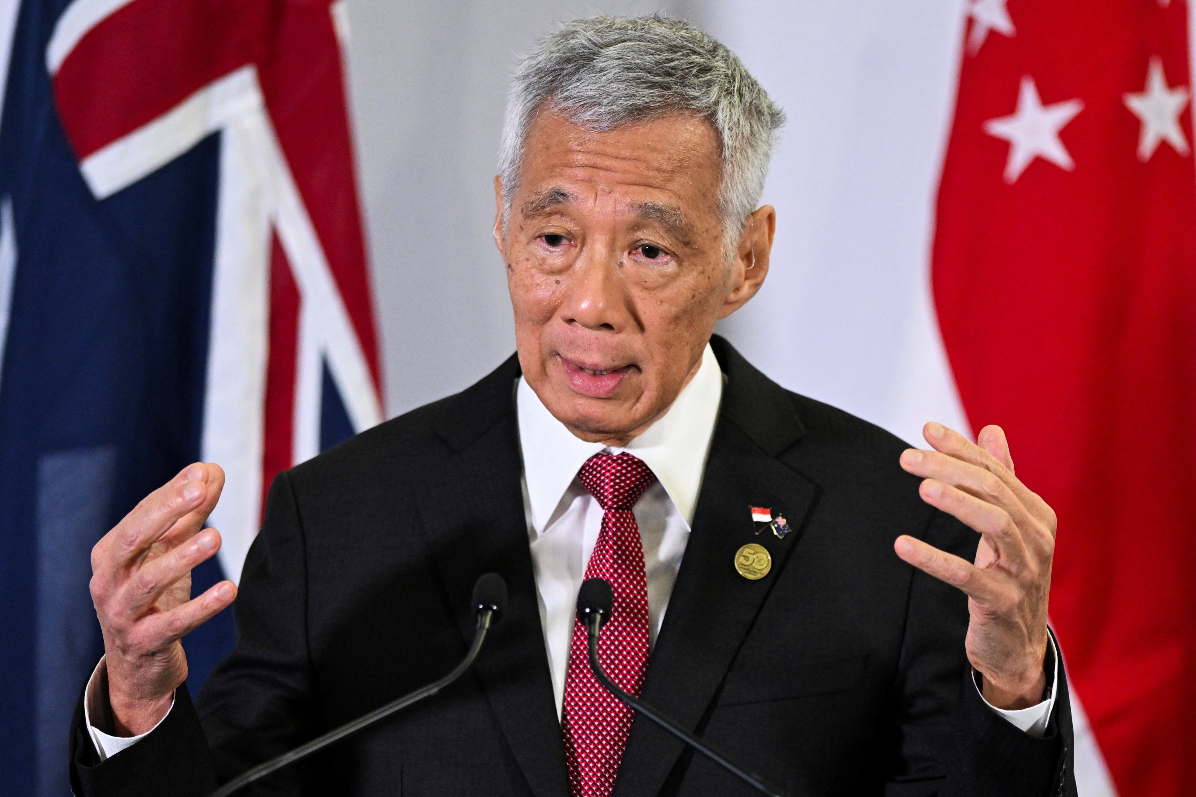 Singapore’s Prime Minister Lee Hsien Loong speaks at a press conference in Australia on March 5. Photo: Reuters