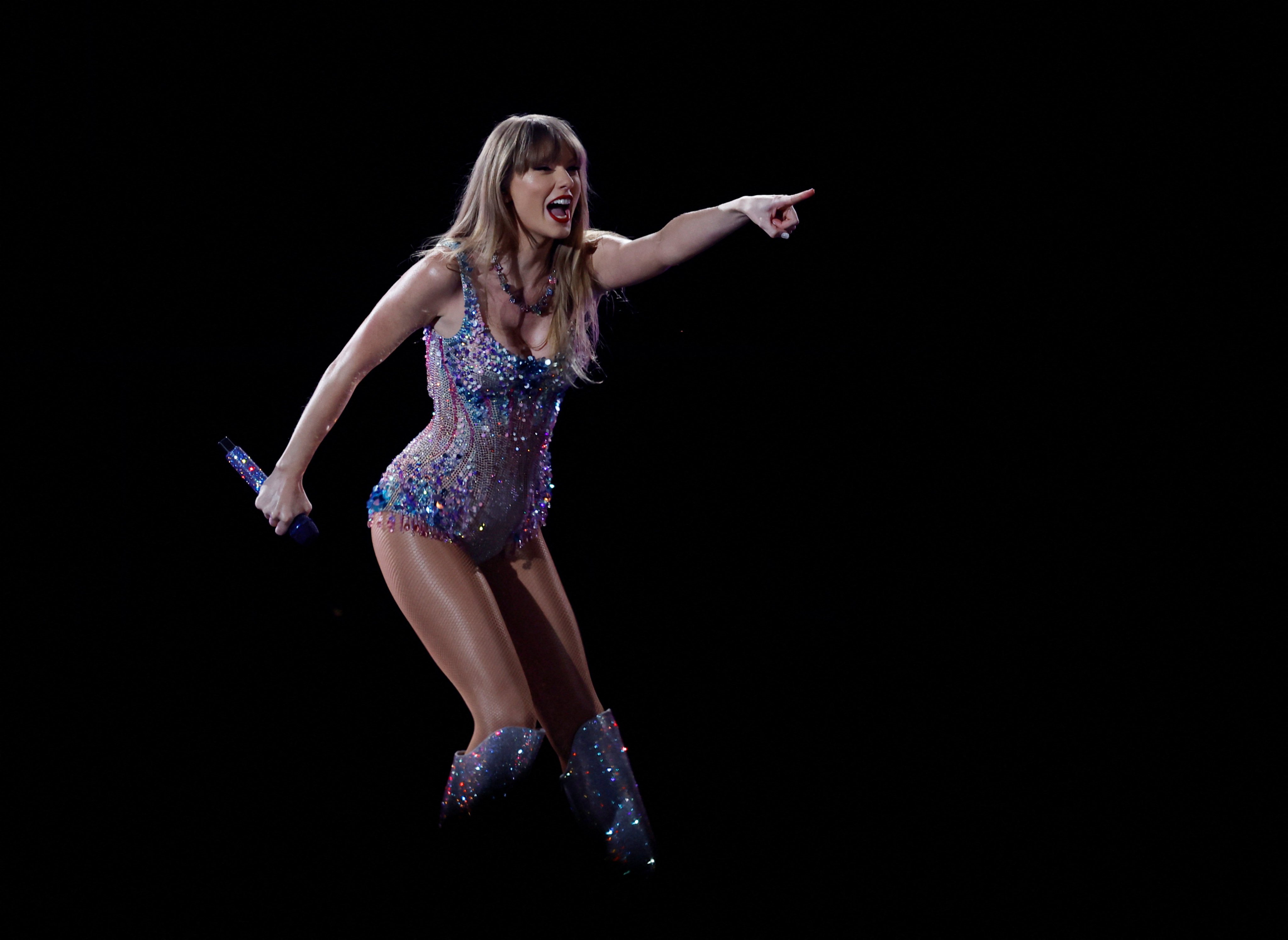 Taylor Swift performs in Tokyo last month. Her six Singapore shows are predicted to bring a multimillion-dollar windfall to the city state. Photo: Reuters