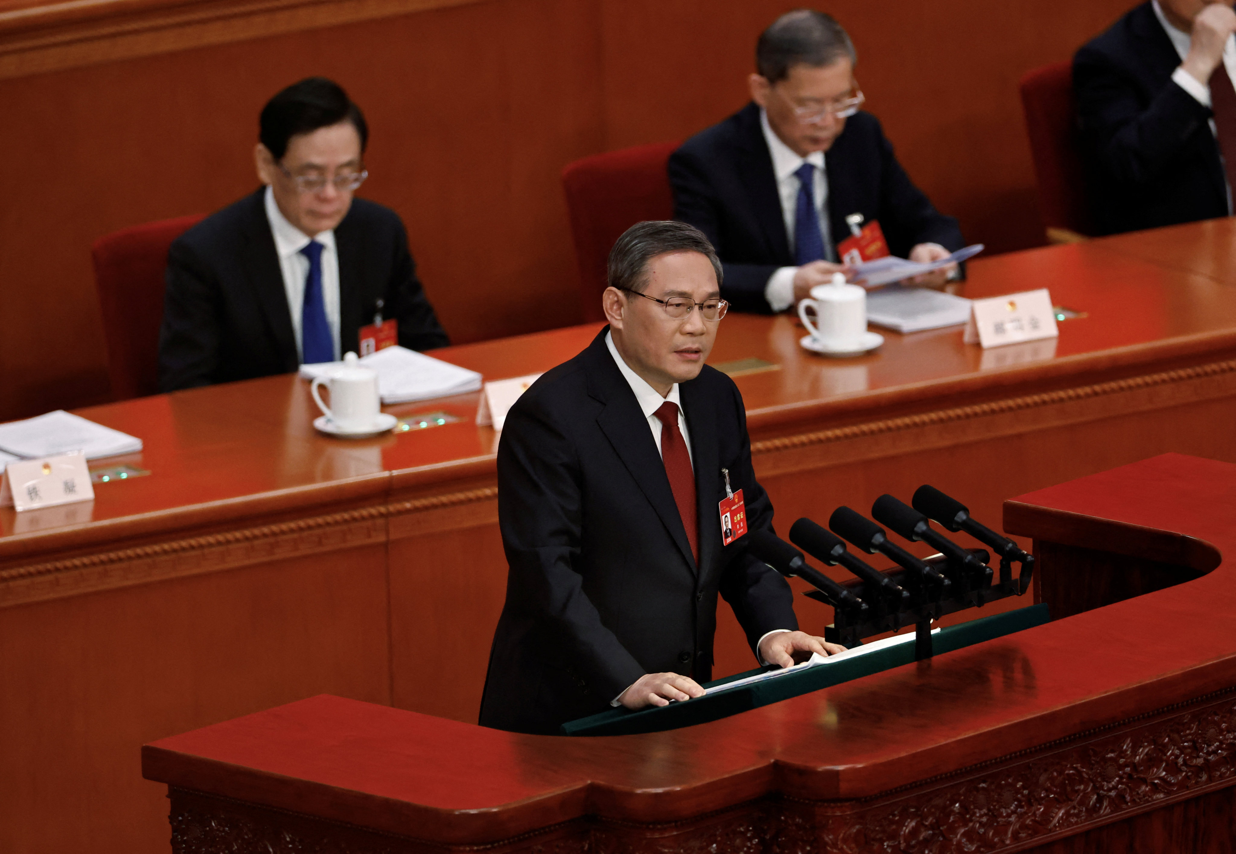 Chinese Premier Li Qiang delivers the government work report at the Great Hall of the People in Beijing on Tuesday. Photo: Reuters