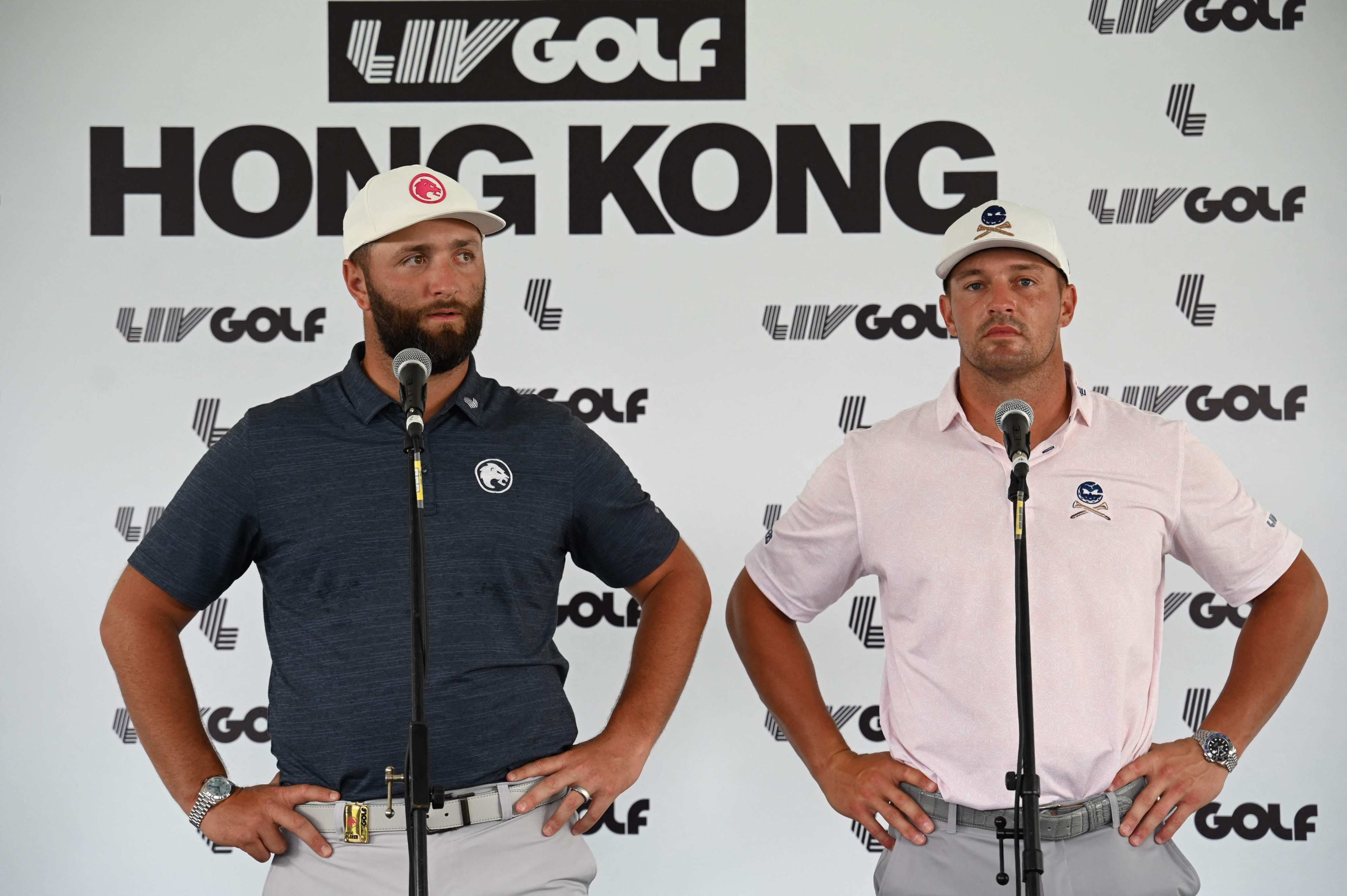 Jon Rahm (left) and Bryson DeChambeau talk to the media ahead of the LIV Golf tournament at Hong Kong Golf Club. Photo: AFP