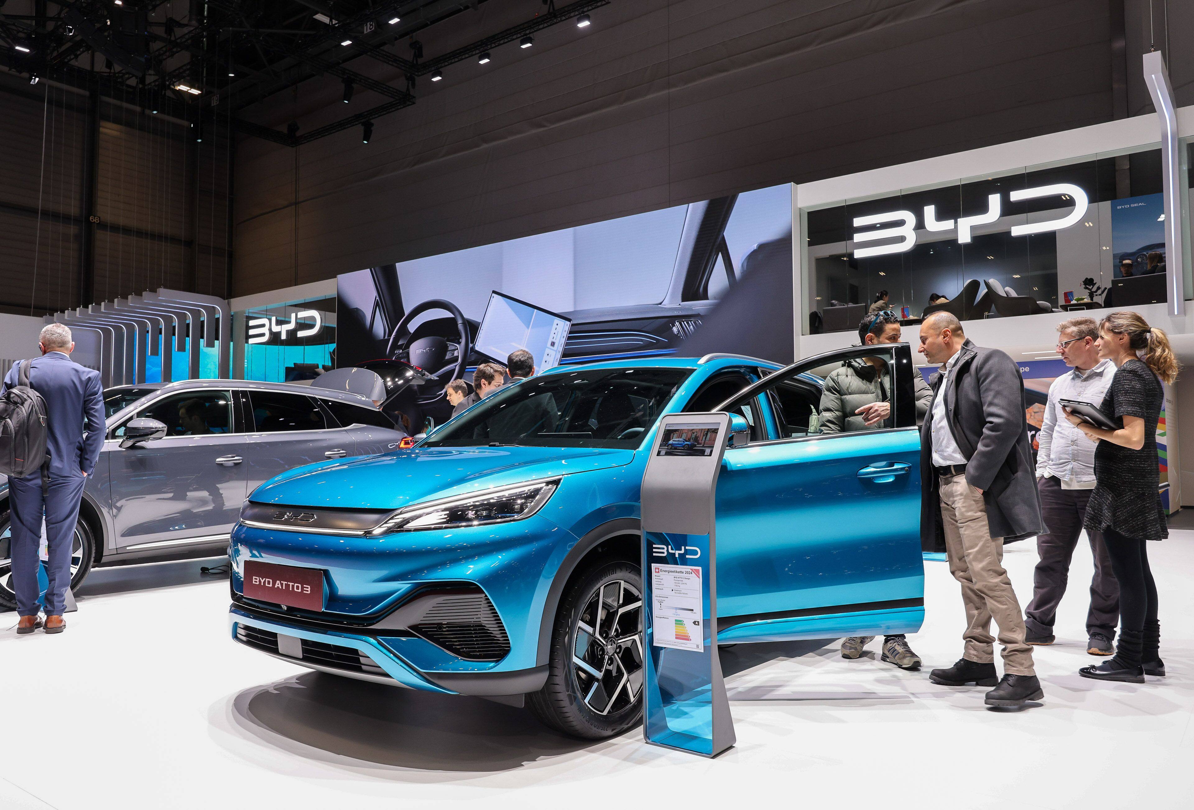 People check out a BYD Atto 3 electric vehicle at the Geneva International Motor Show in Switzerland, on February 27. The Chinese automaker’s SUV has received full marks for safety from European inspectors. Photo: Bloomberg