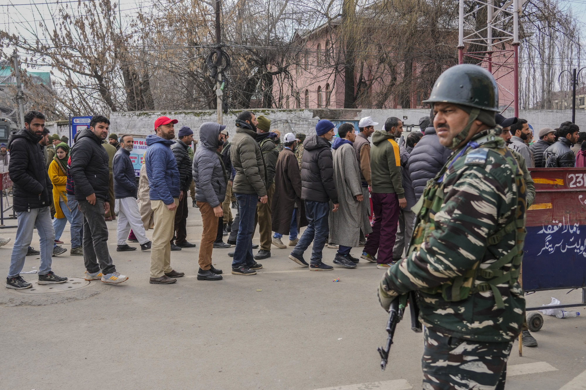 A paramilitary soldier stands guard outside a venue where Indian Prime Minister Narendra Modi is scheduled to address a public rally in Srinagar on Thursday. Photo: AP