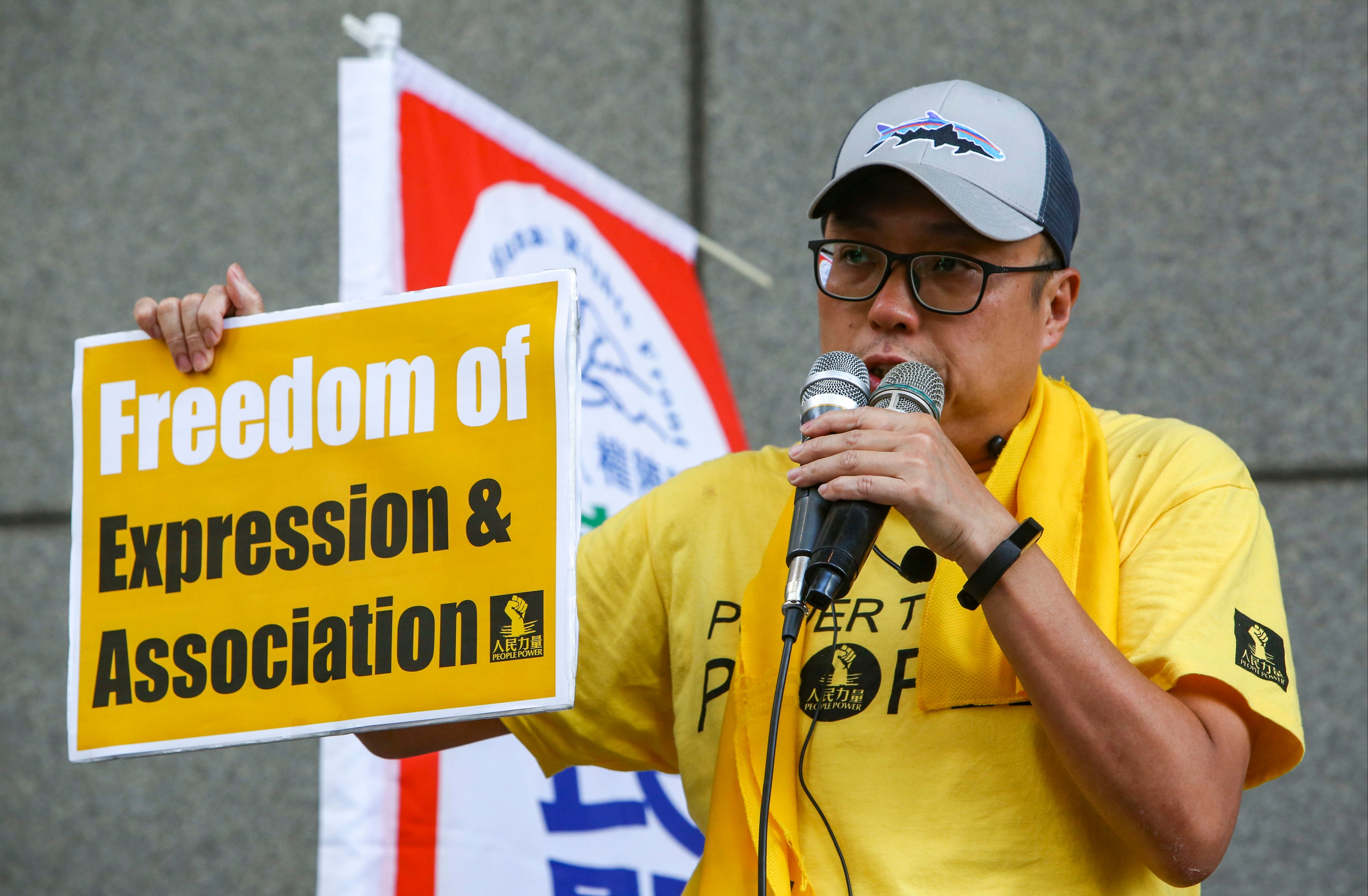 Former activist Tam Tak-chi speaks during a protest rally in 2018. Tam was found guilty of colonial-era sedition charges. Photo: Edmond So