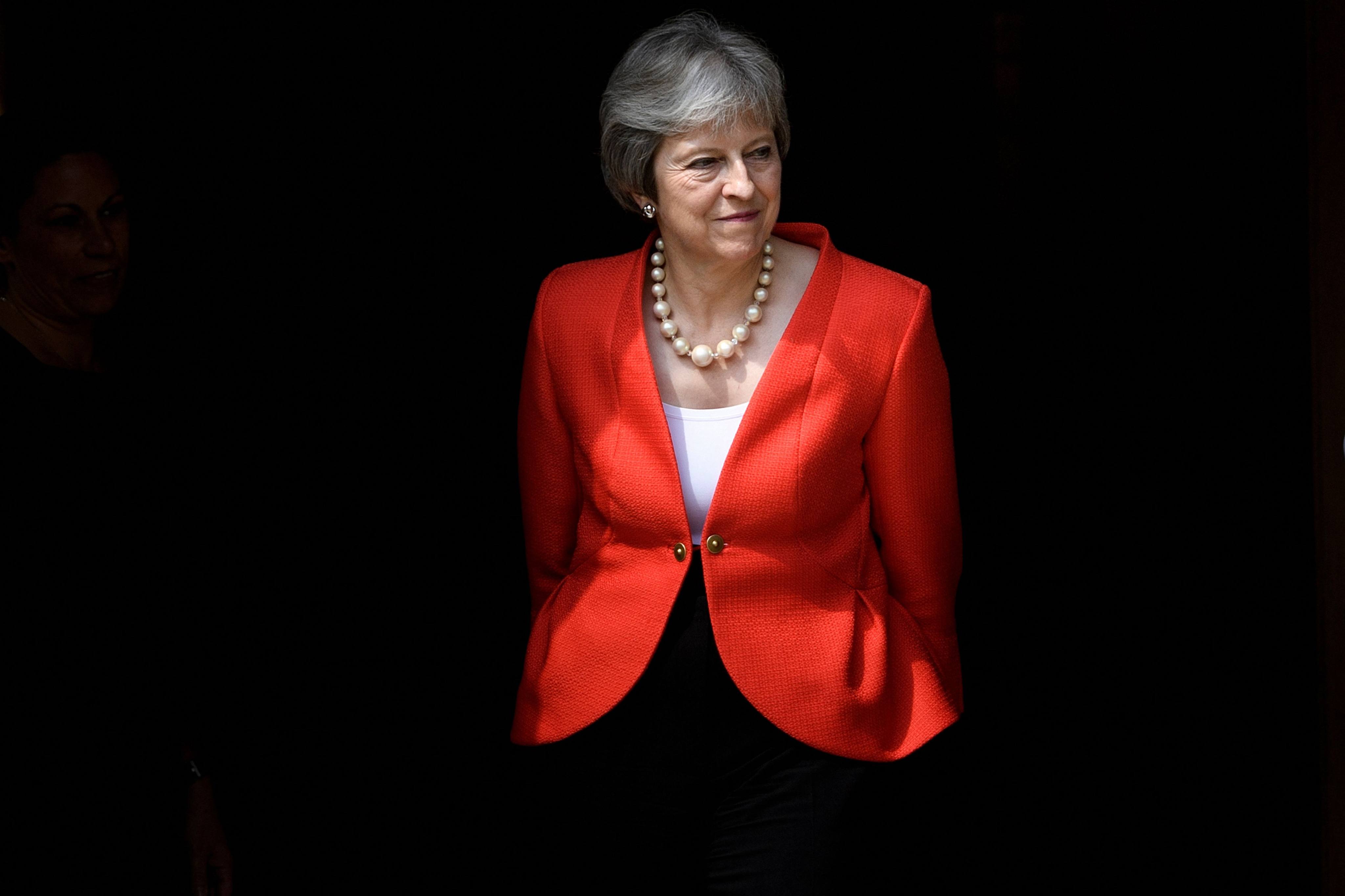 Britain’s former Prime Minister Theresa May announced that she will stand down as a member of parliament at the next general election, due to take place later this year. Photo: AFP