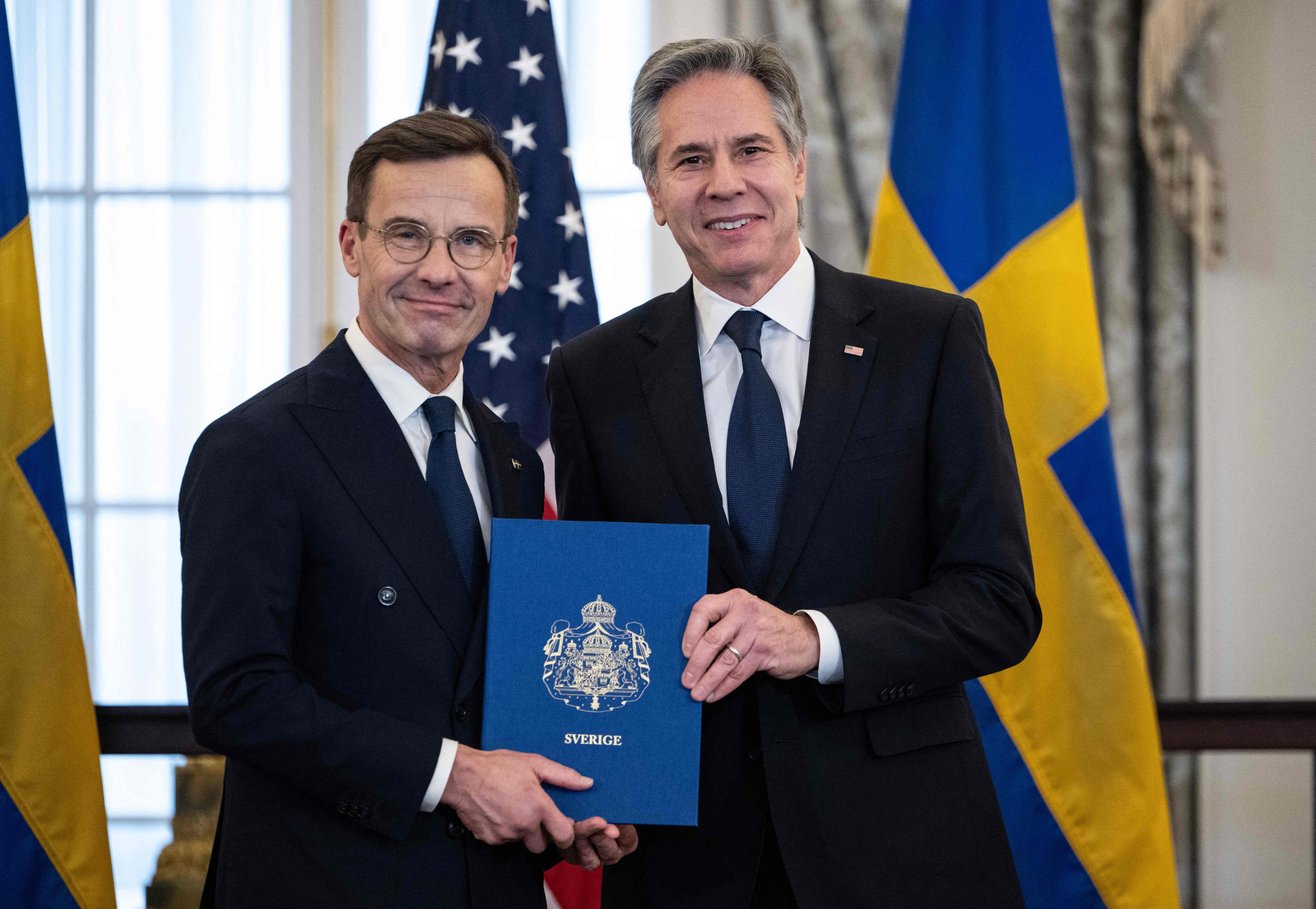 US Secretary of State Antony Blinken receives the Nato ratification documents from Swedish Prime Minister Ulf Kristersson in Washington. Photo: AFP