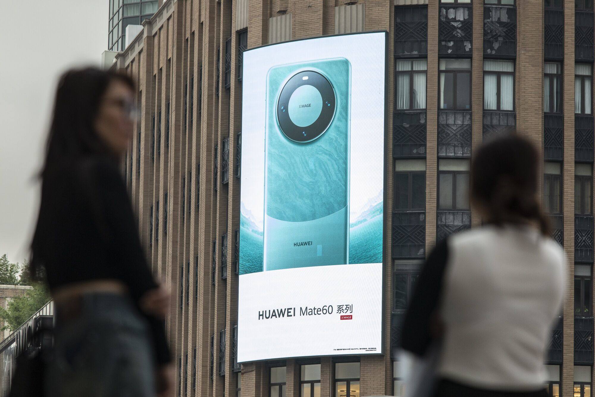An advertisement for Huawei Technologies’ Mate 60-series smartphones is seen in Shanghai on September 17, 2023. Photo: Bloomberg