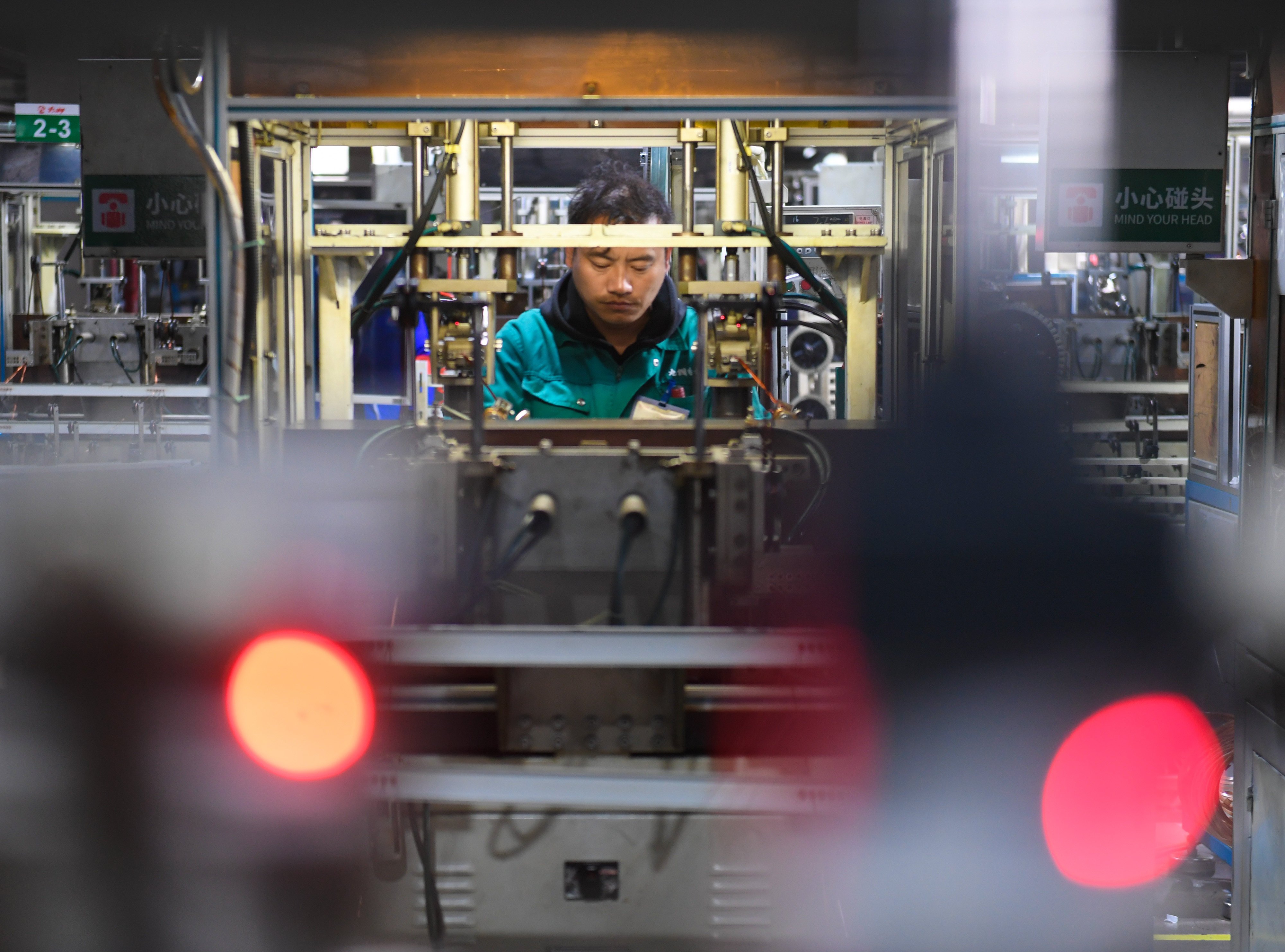 A staff member processes motor parts at Zhejiang Jiuzhou New Energy Technology in Wenling, Taizhou, east China’s Zhejiang province. Photo: Xinhua