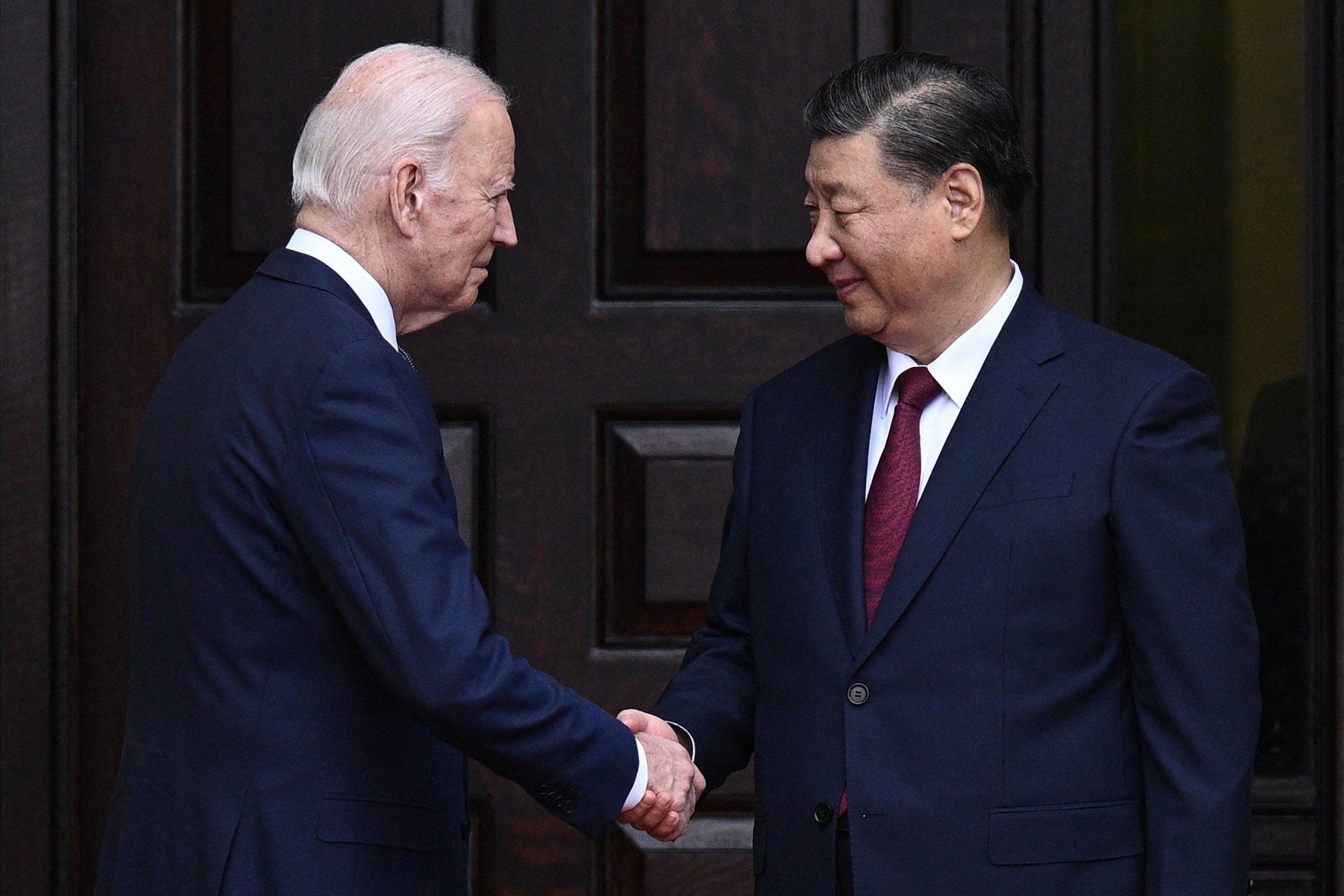 Biden greeting Chinese President Xi Jinping before a meeting in Woodside, California, on November 15, 2023. Photo: AFP/Getty Images/TNS