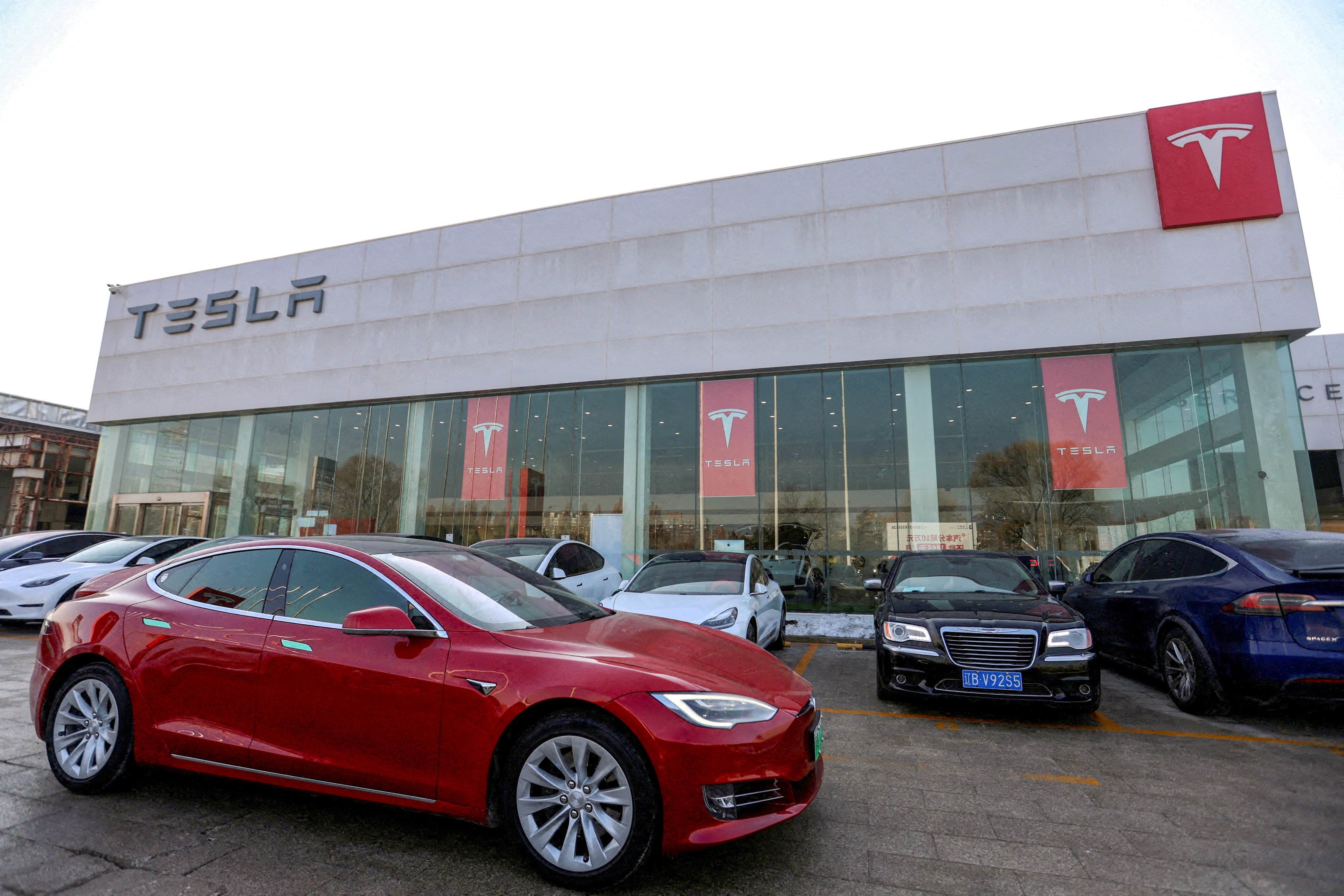 A Tesla showroom in Beijing. The US carmaker is giving a subsidy of 8,000 yuan to buyers who get their cars insured from its partners. The subsidy is valid until the end of March. Photo: Reuters