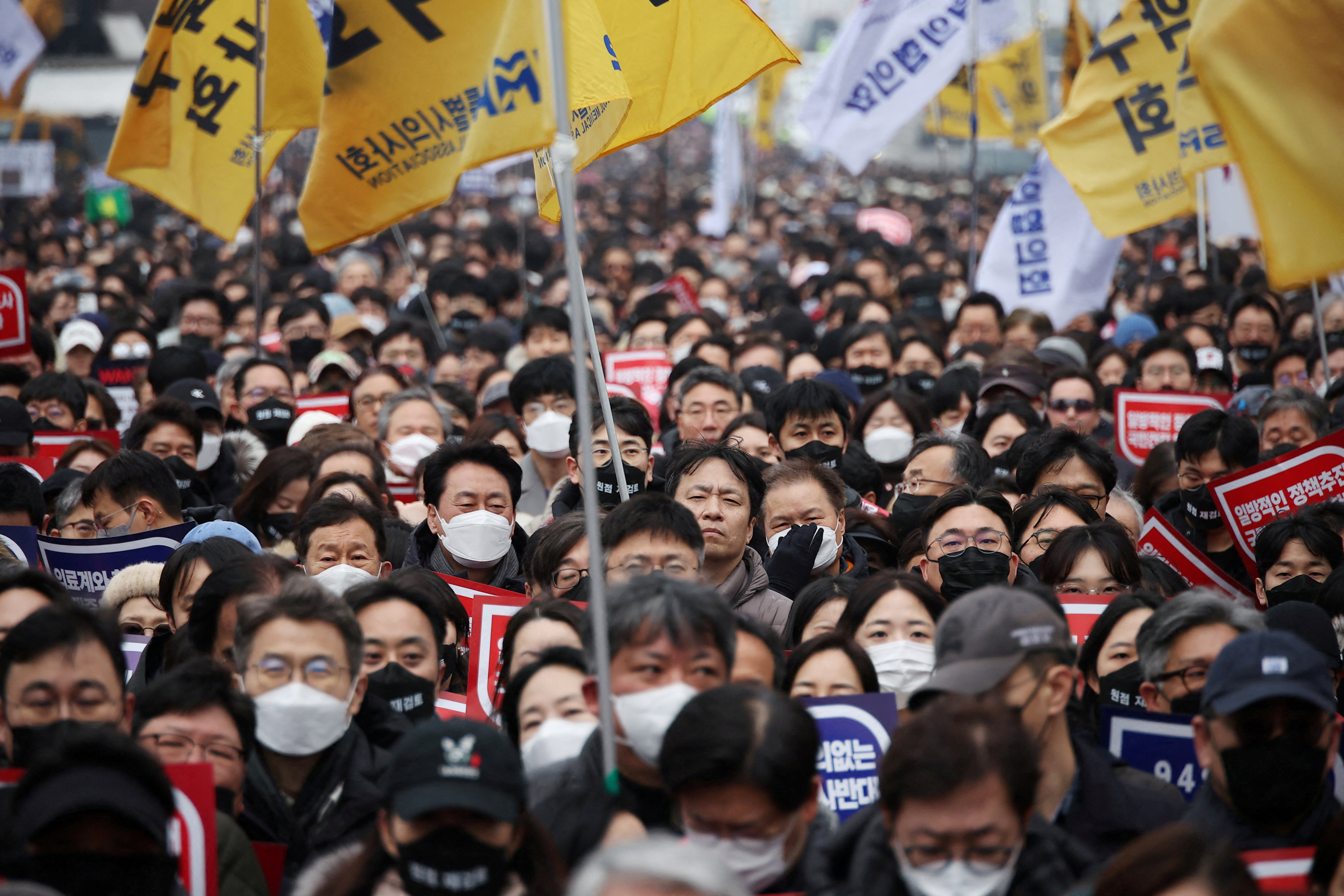 Doctors take part in a rally to protest against government plans to increase medical school admissions in Seoul. Photo: Reuters