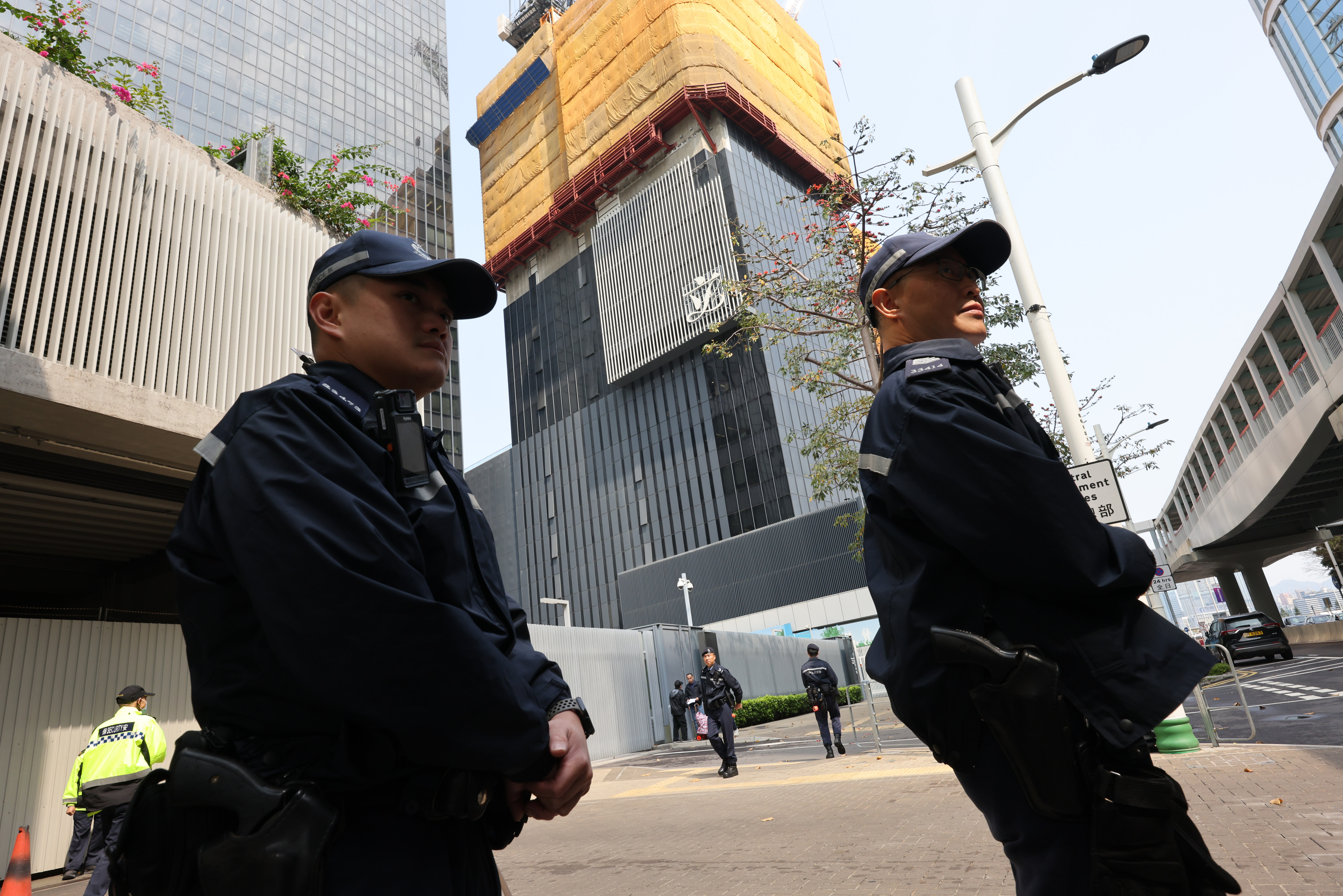 Police officers patrol the grounds outside the Legco building on Friday. Photo: Jelly Tse