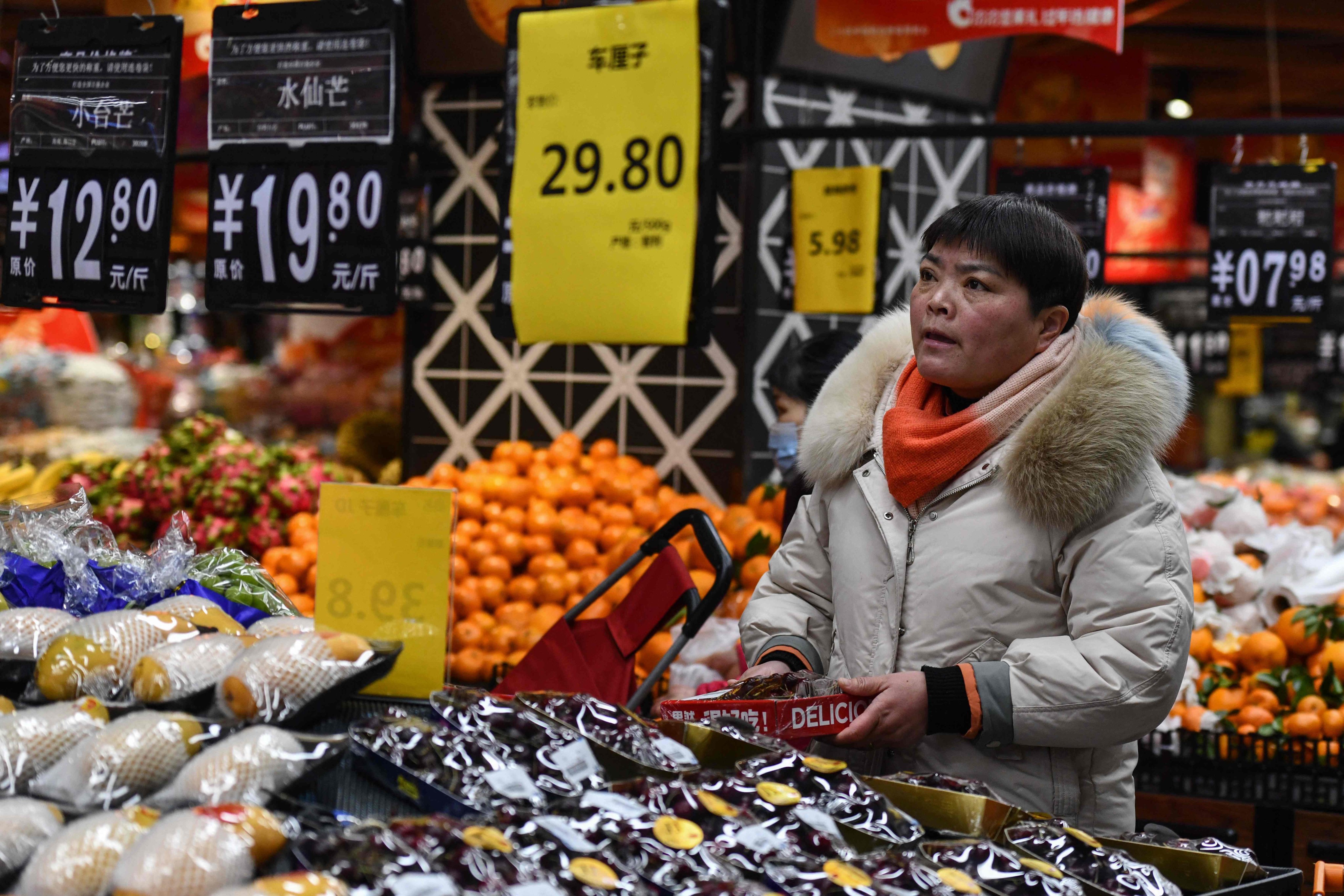 The Lunar New Year tends to be accompanied by greater spending and rising prices, which analysts say contributed to February’s CPI rebound. Photo: AFP