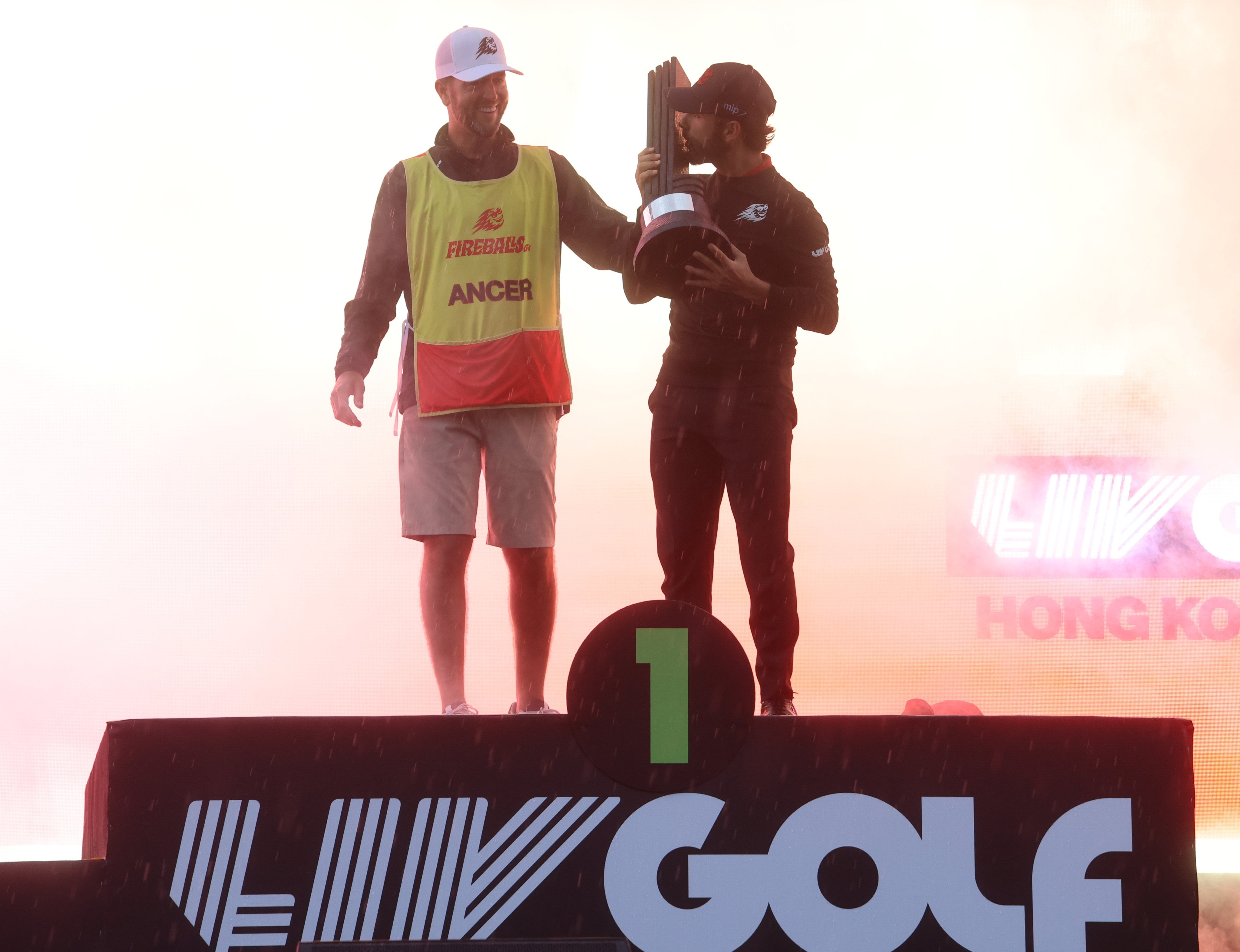 Caddie Dale Vallely (left) and Abraham Ancer celebrate after winning LIV Golf Hong Kong. Photo: Dickson Lee