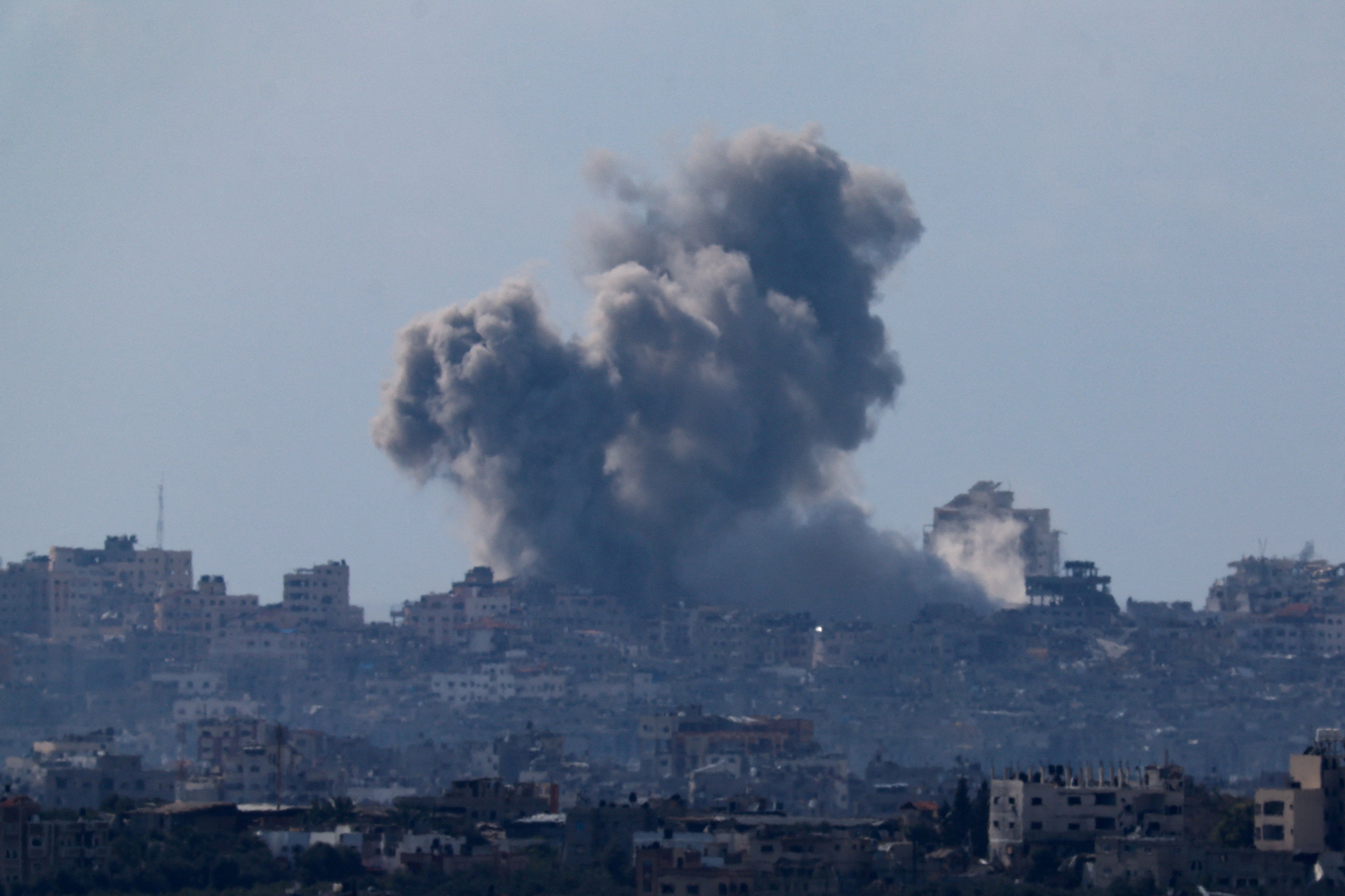Smoke rises from Gaza during an explosion following an air strike on Saturday. Photo: Reuters