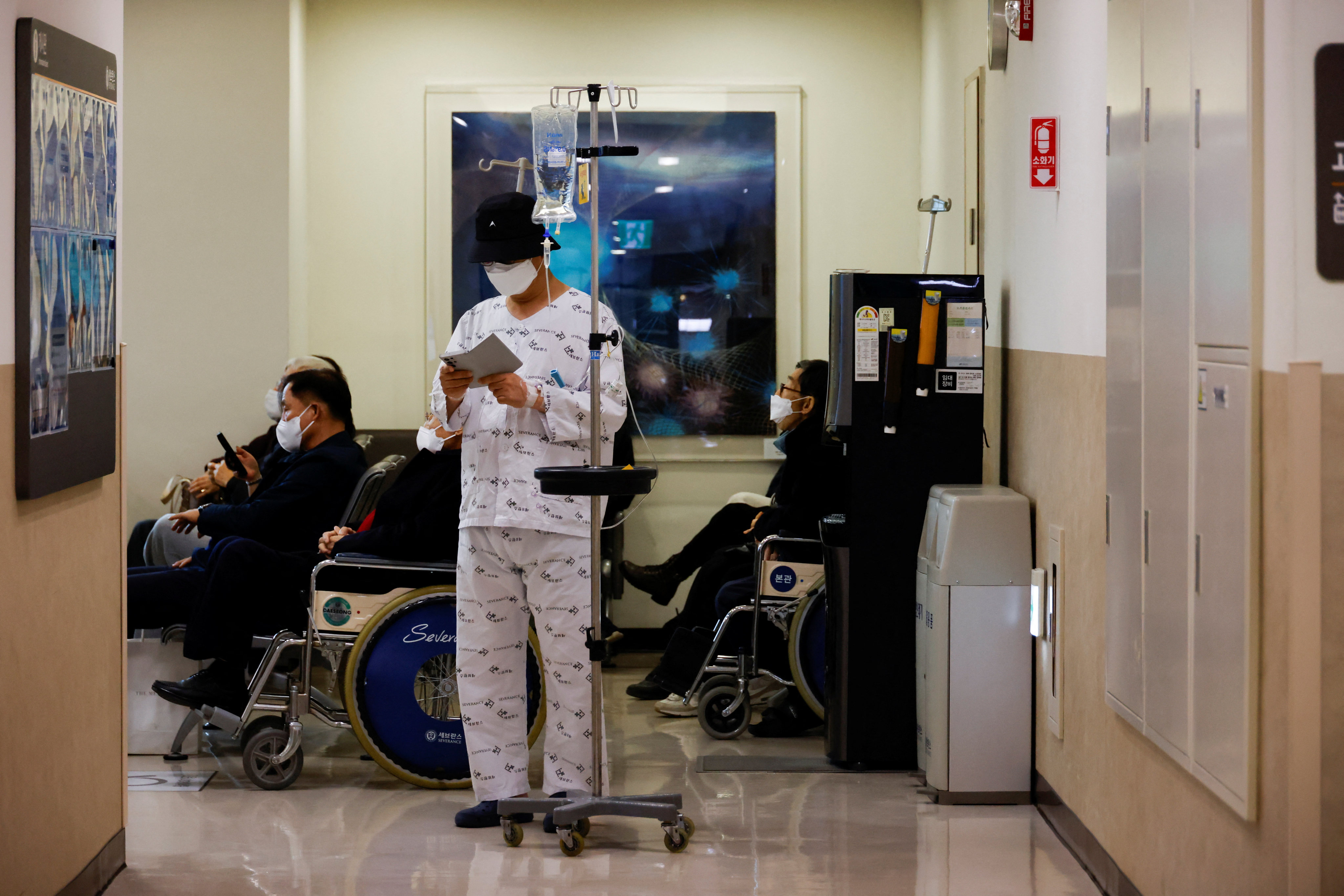 A patient stands at a hospital in Seoul, South Korea. Photo: Reuters