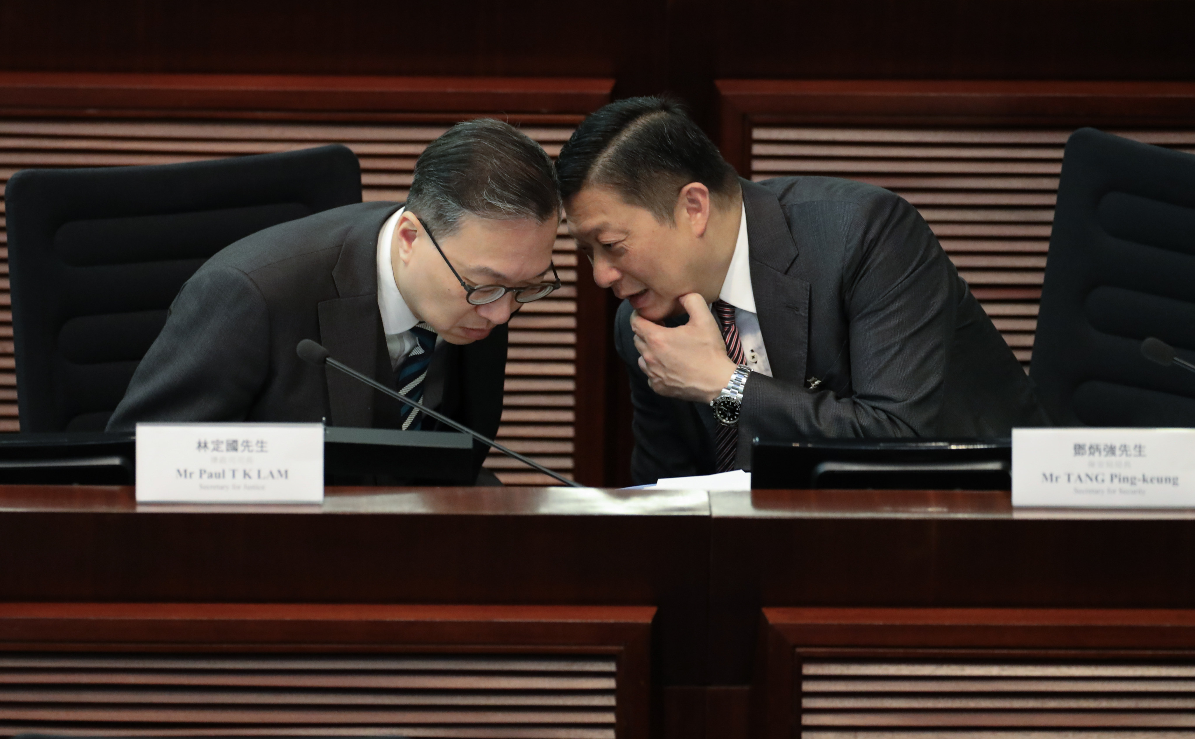Secretary for Justice Paul Lam (left) and Secretary for Security Chris Tang discuss the Safeguarding National Security Bill at the Legislative Council Complex. Photo: Sun Yeung