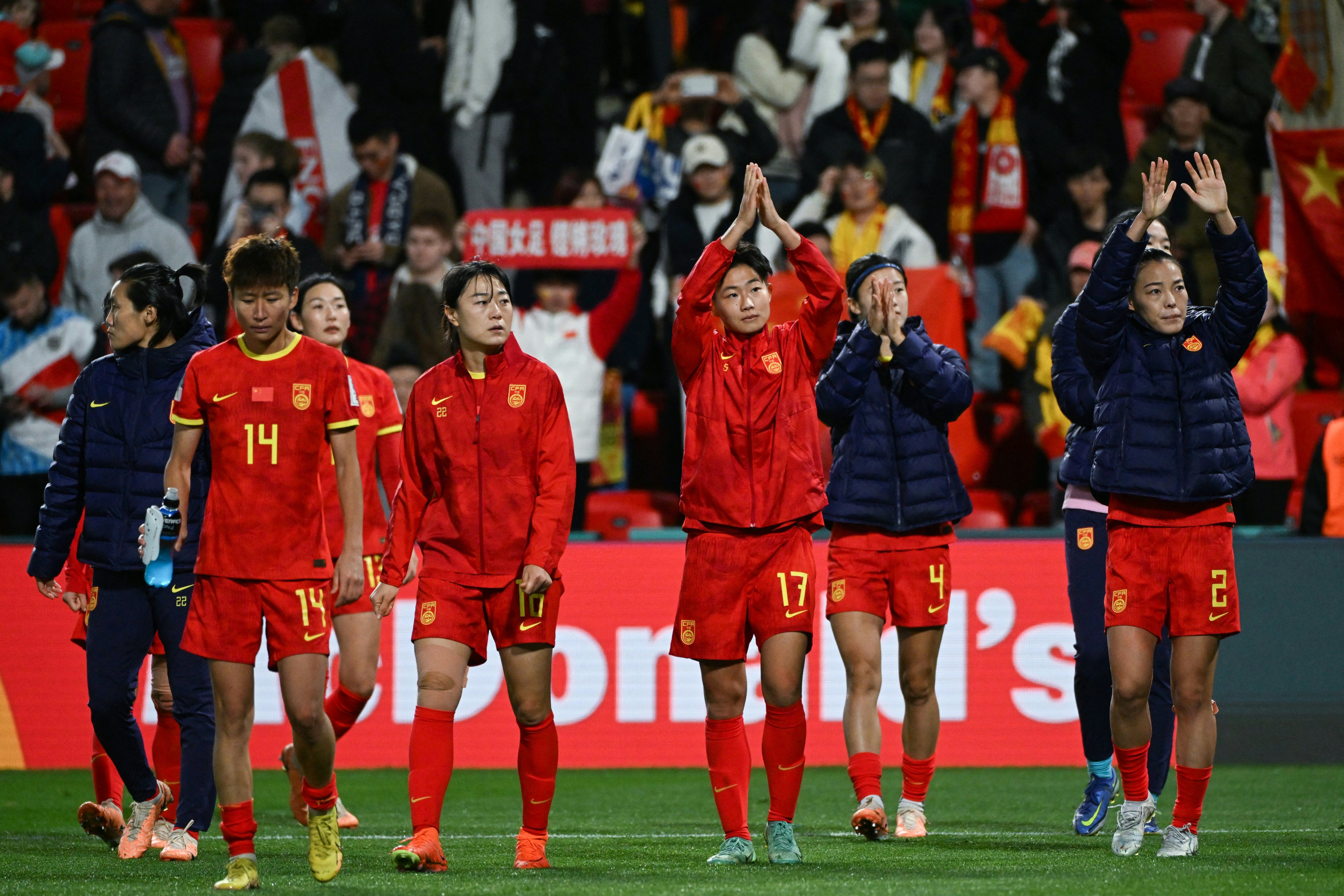 China players applaud the fans after the end of their 2023 Women’s World Cup Group D football match against England. Photo: AFP