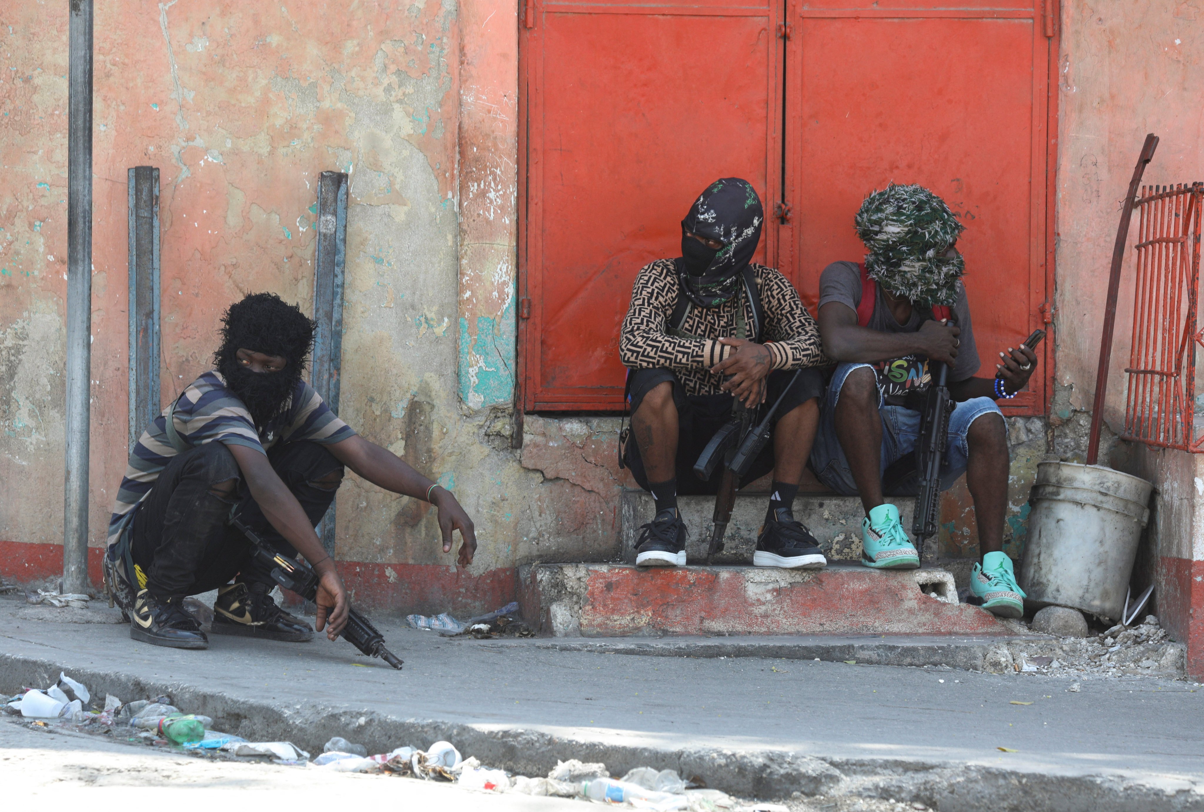 Armed gang members in Port-au-Prince, Haiti. Photo: Reuters