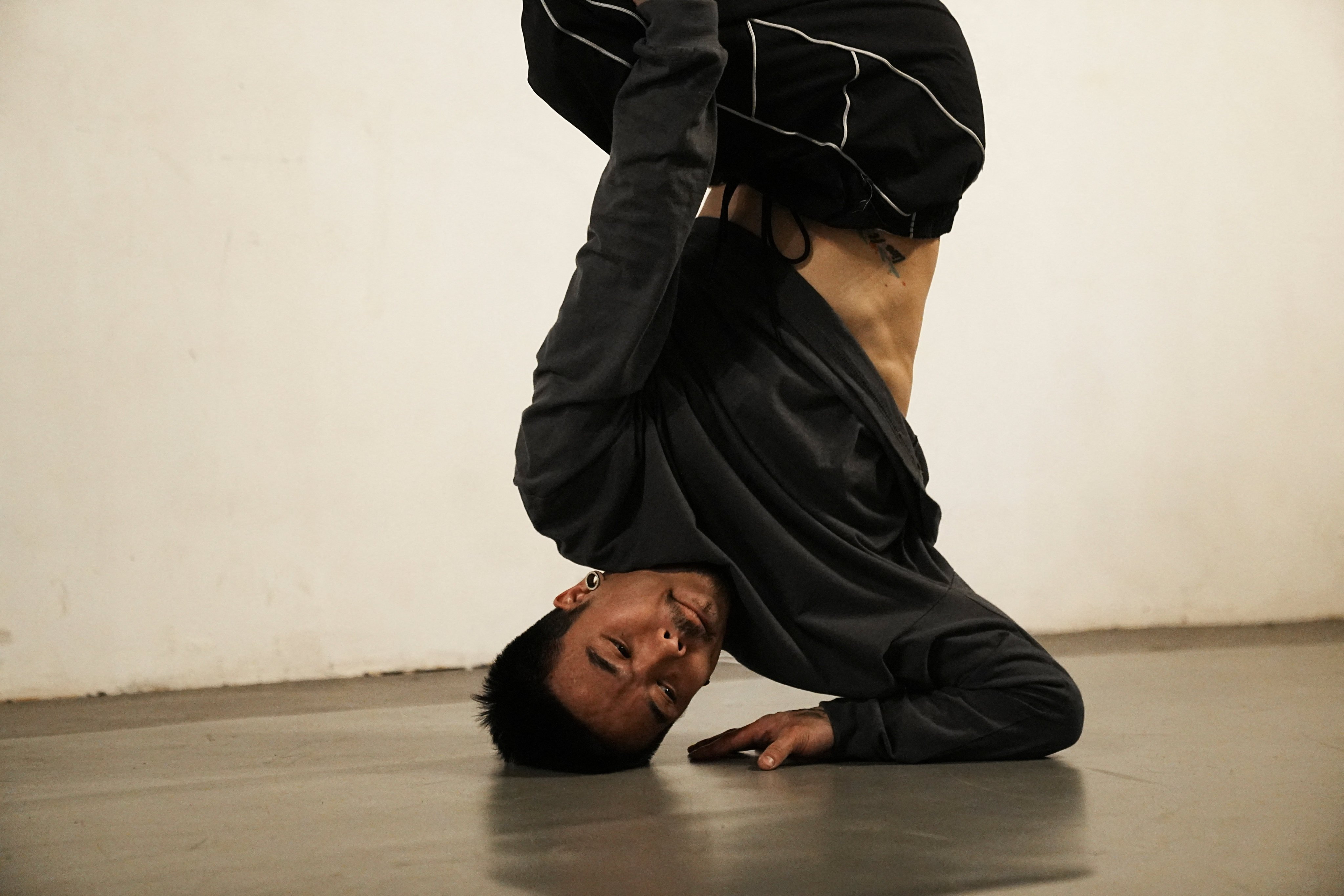 Breakdancer Cheung Cheuk-Man practices at a dancing studio in Hong Kong. Photo: Reuters