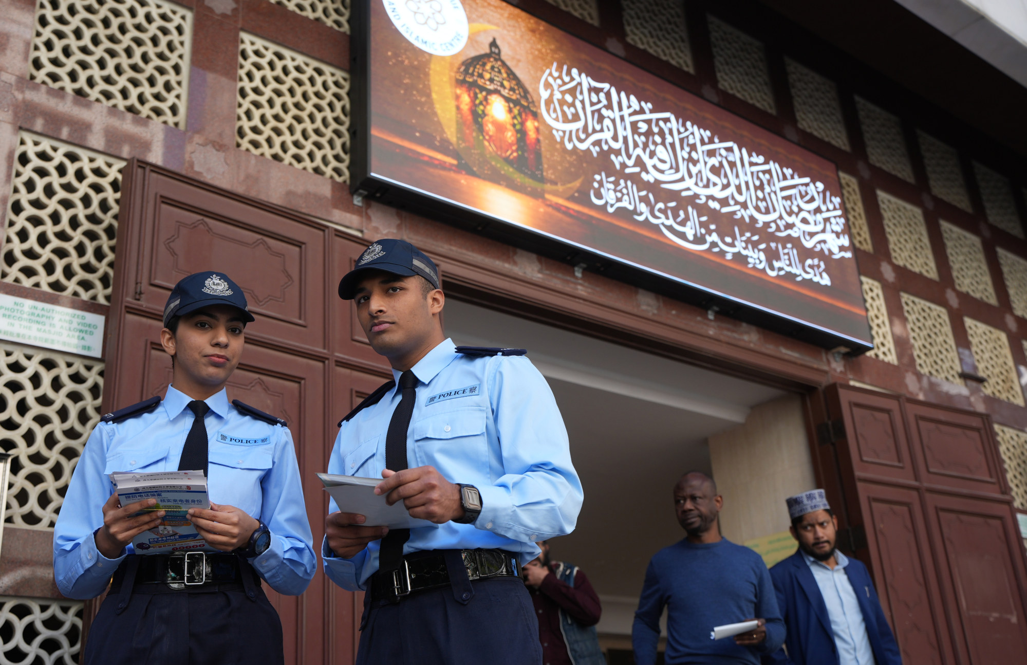 Salma Bibi (left) and Adnan Mohammad (second left) at Kowloon Mosque. Photo: Eugene Lee