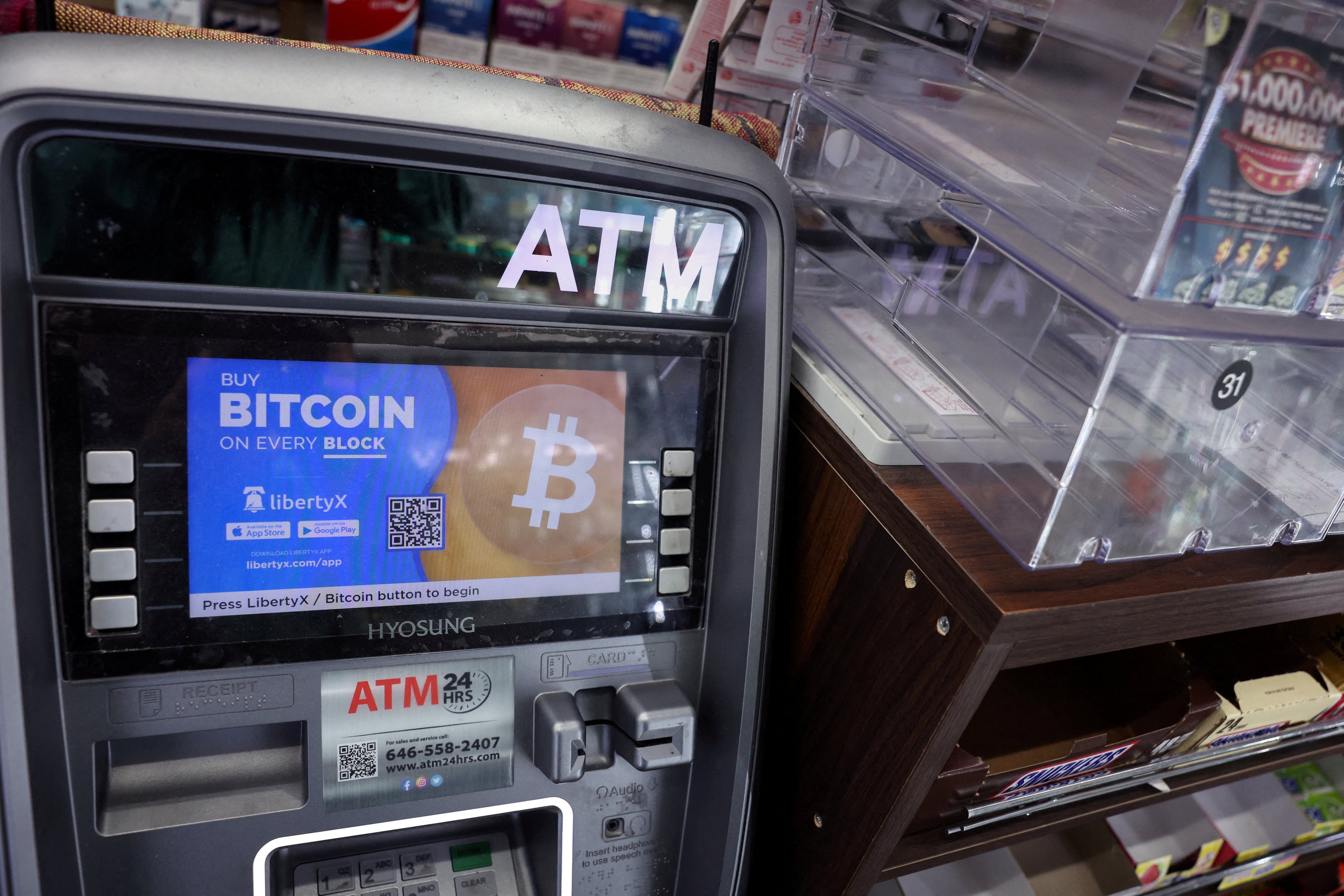 A bitcoin ATM sits in the corner of a store in New York on March 5. Bitcoin’s price has surged after US regulators allowed exchange-traded funds that track the spot price of the cryptocurrency, but there are also fears that increased mainstream appeal will bring calls for greater regulation. Photo: Reuters