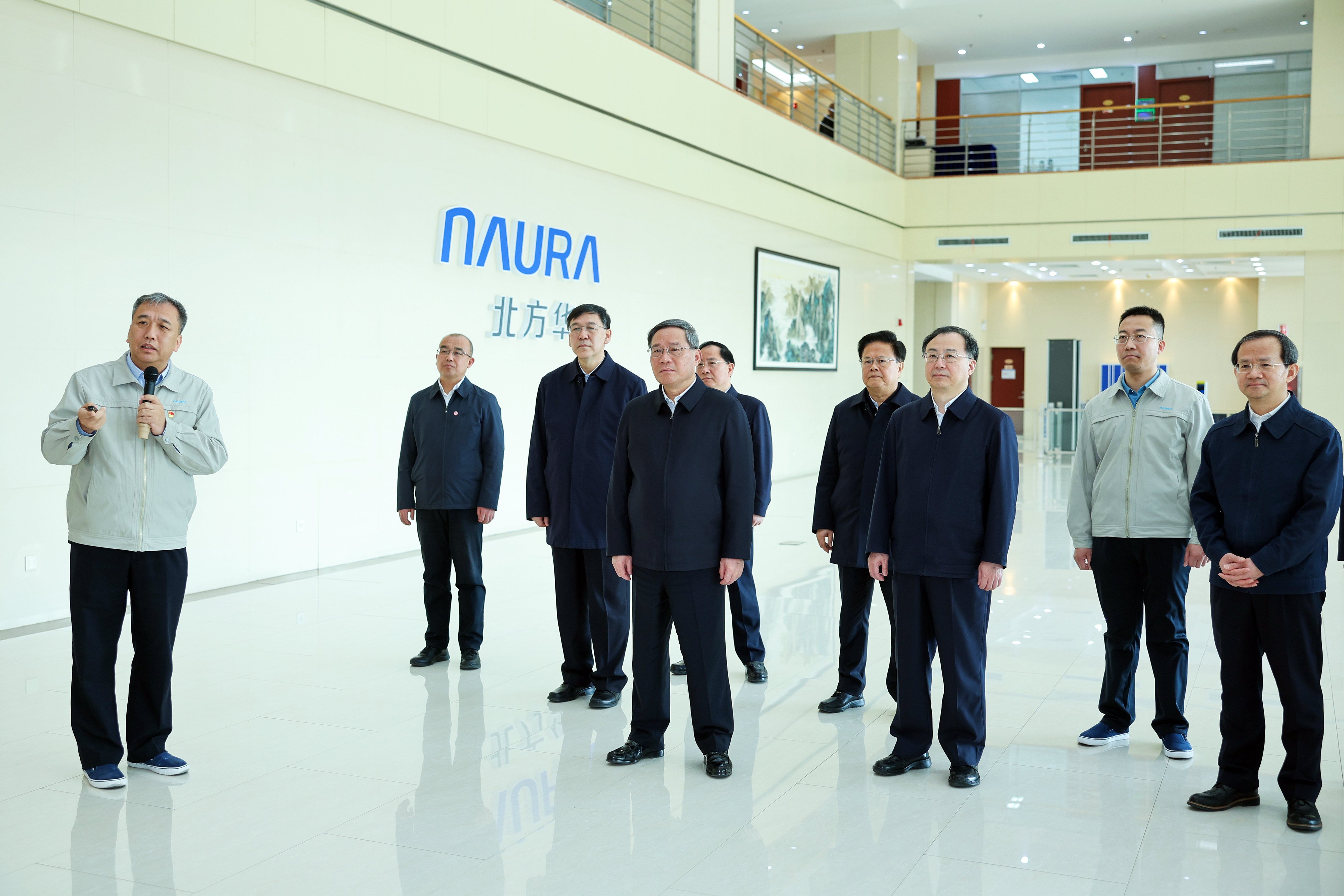 Premier Li Qiang visits Naura Technology Group during an inspection tour on Wednesday. Photo: Xinhua