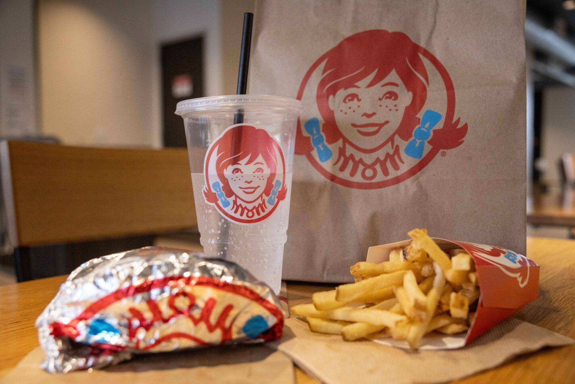 A Wendy’s Co. food order arranged at a restaurant in the Queens borough of New York. The fast-food chain has moved to clarify comments that some interpreted as calling for Uber-like surge pricing when demand is high. Photographer: Bloomberg