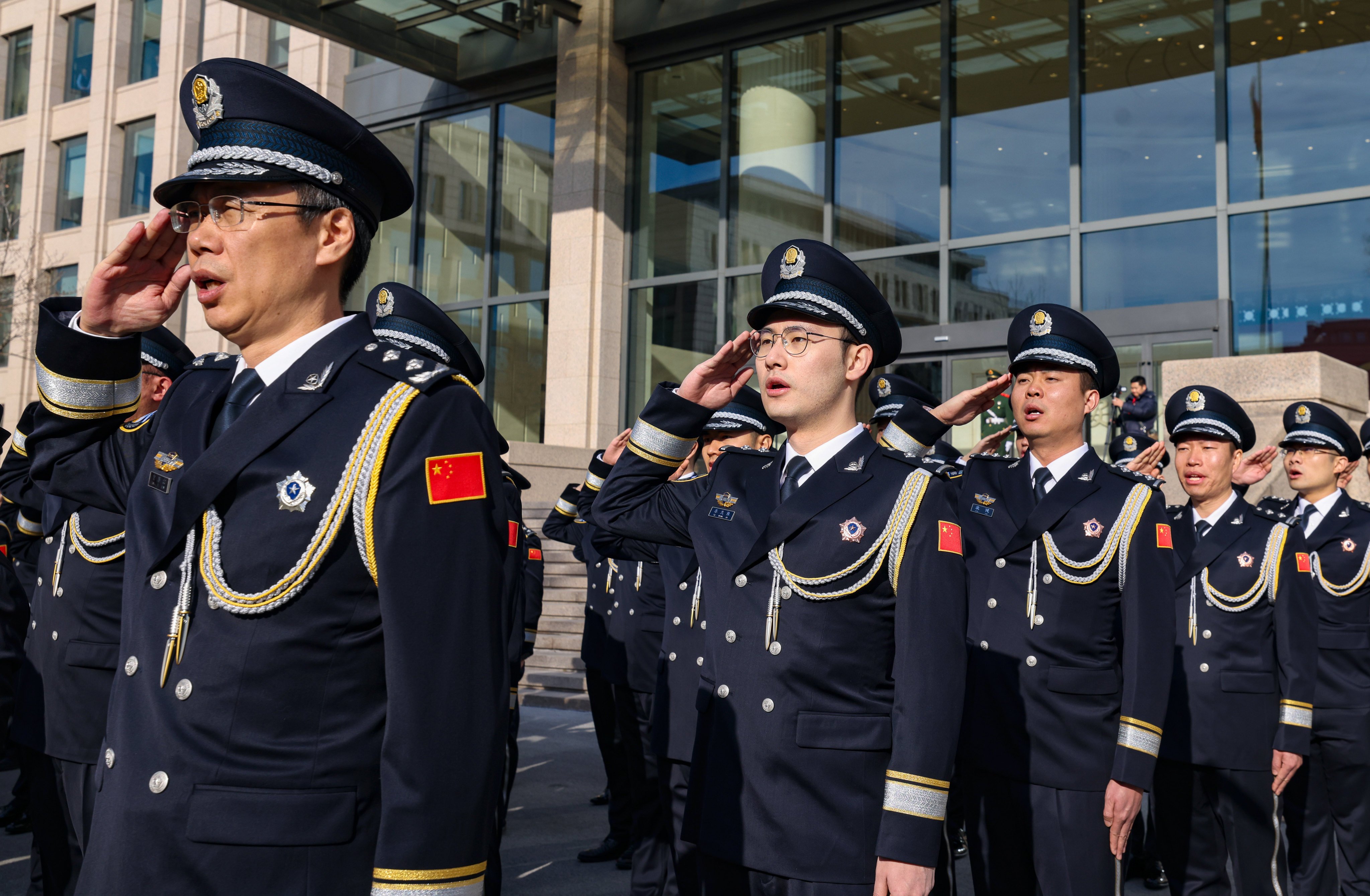 Police officers take part in a flag-raising ceremony at the Ministry of Public Security in Beijing, China on January 10, 2024. Photo: Xinhua