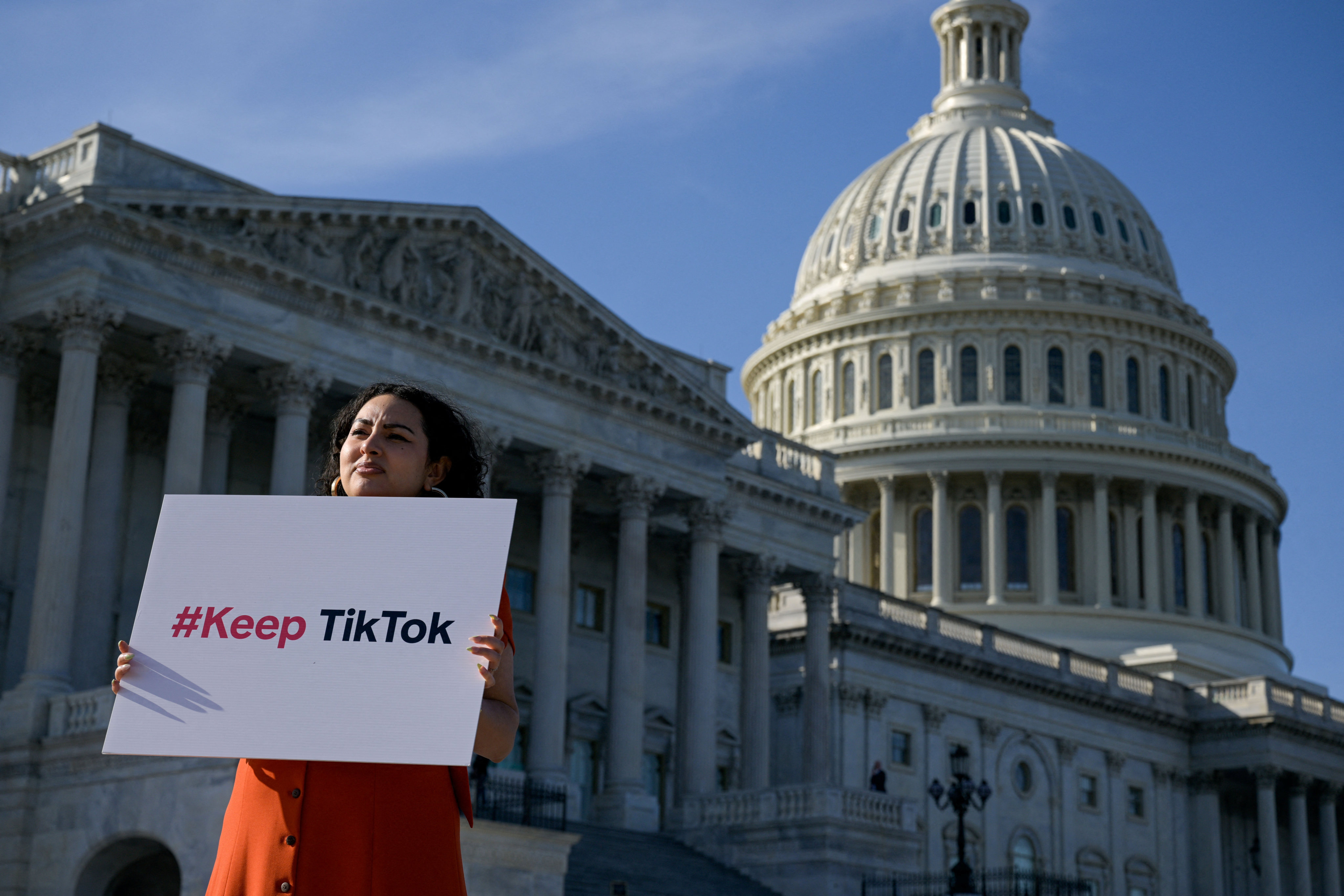 A TikTok creator protests outside the US Capitol in Washington on March 12. Photo: Reuters