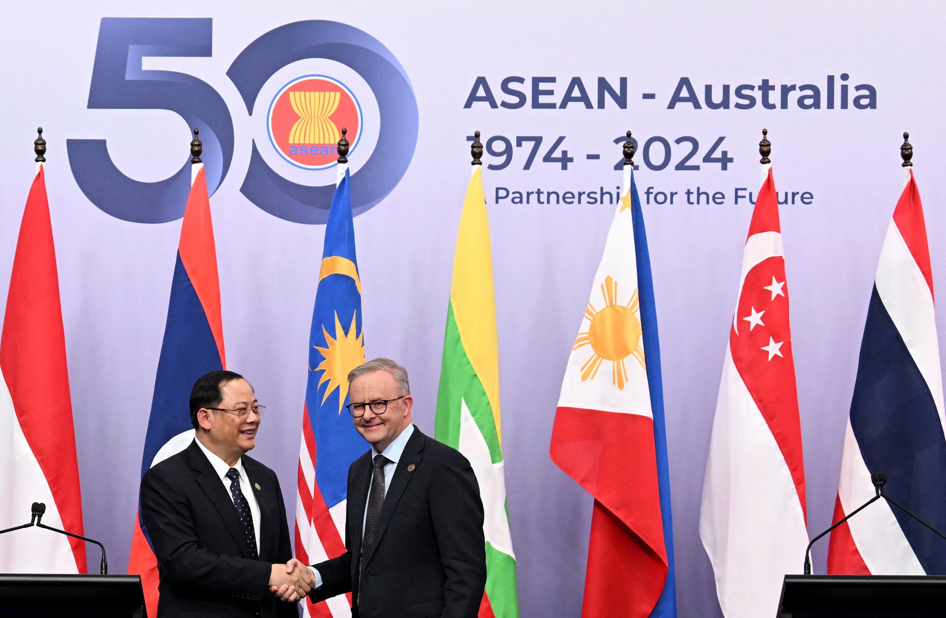 Australia’s Prime Minister Anthony Albanese (right) shakes hands with Laos’ Prime Minister Sonexay Siphandone, during the Asean-Australia Special Summit in Melbourne, Australia, on March 6. Photo: Reuters