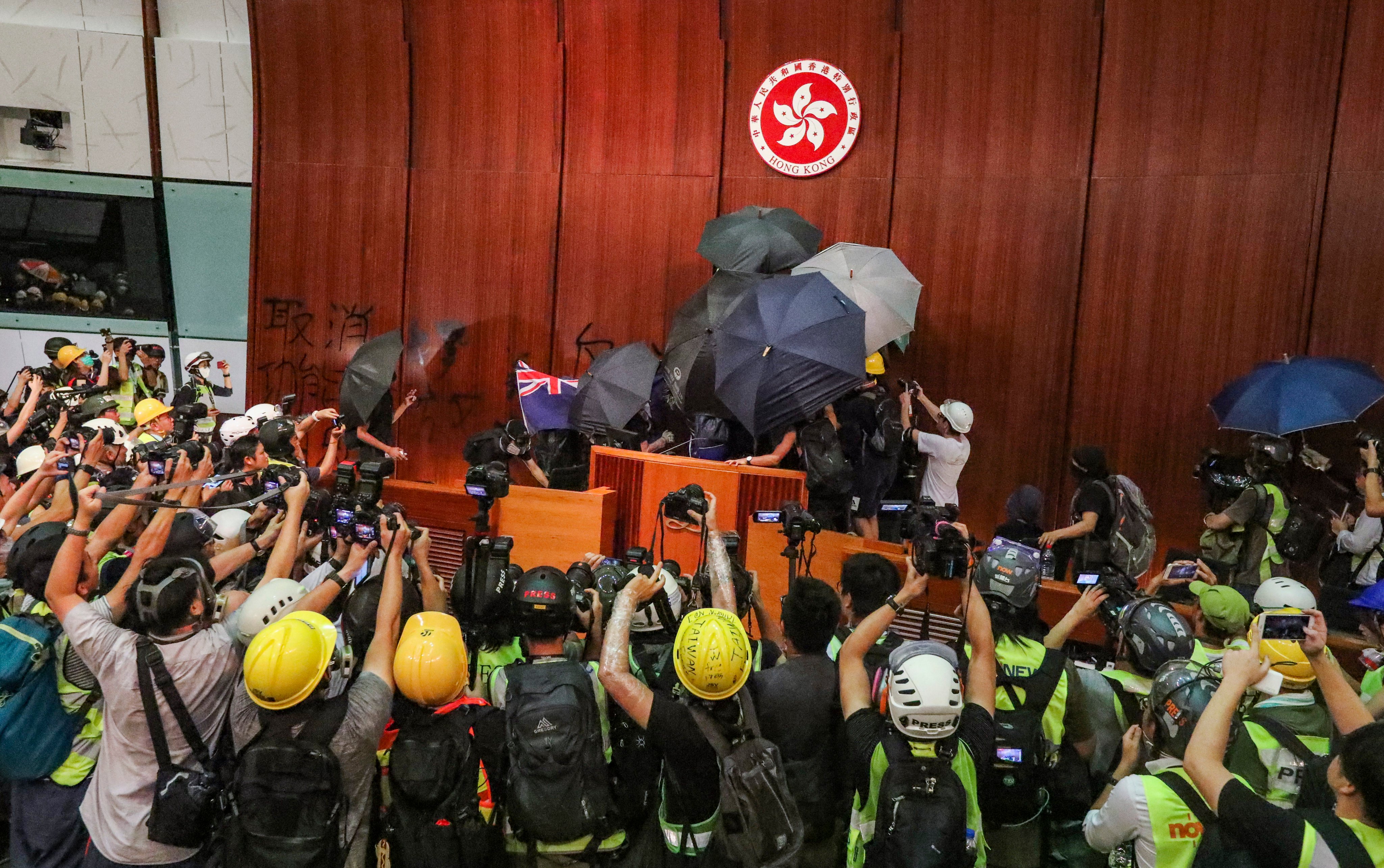 Political activists at the Legislative Council complex in 2019. Hong Kong authorities expressed disapproval over a BBC report covering the sentencing of activists over the incident. Photo: Felix Wong