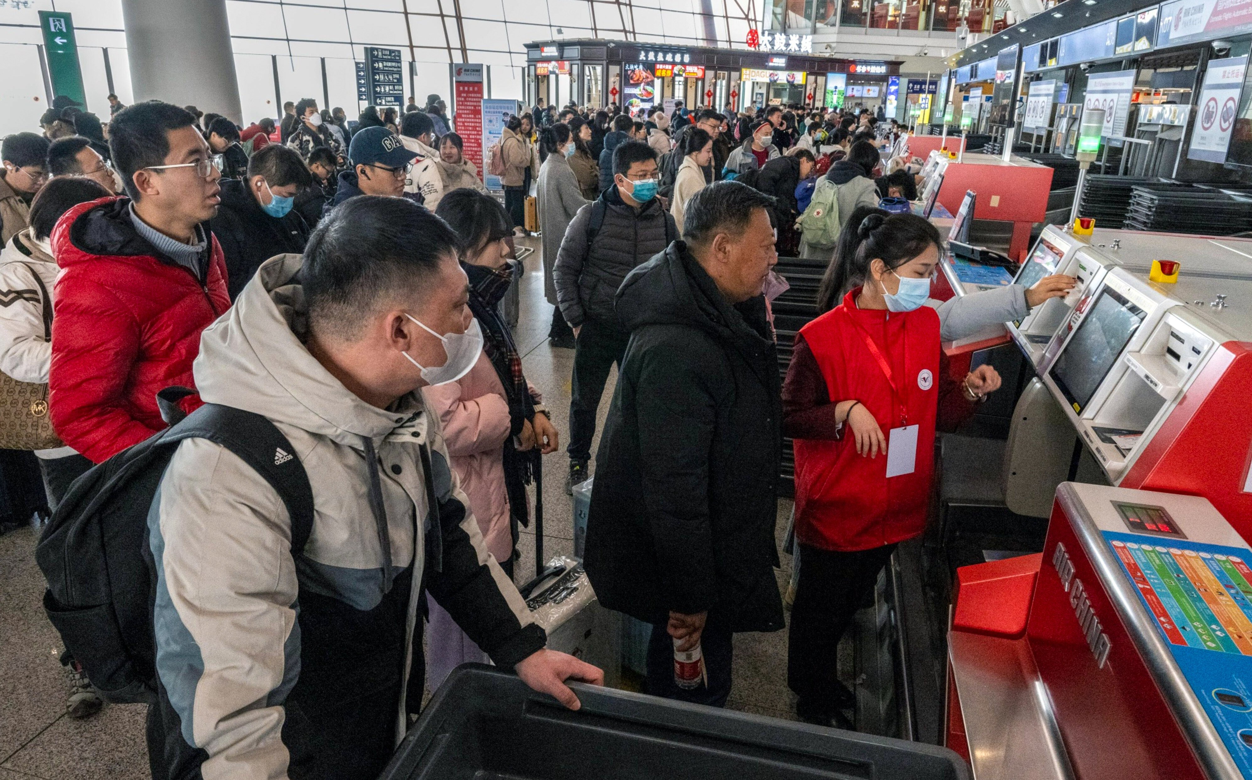 Beijing Capital International Airport is seen packed in the lead-up to the Lunar New Year holiday last month. Photo: Bloomberg