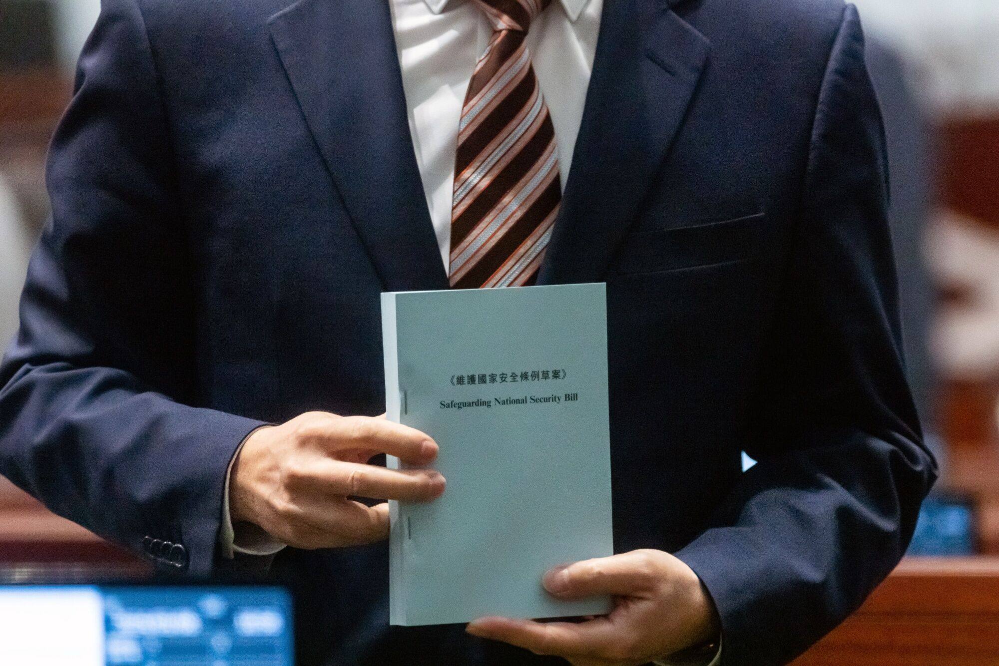 A copy of the proposed Safeguarding National Security Bill is displayed following a special meeting for Article 23 legislation at the Legislative Council in Hong Kong on March 8. Photo: Bloomberg
