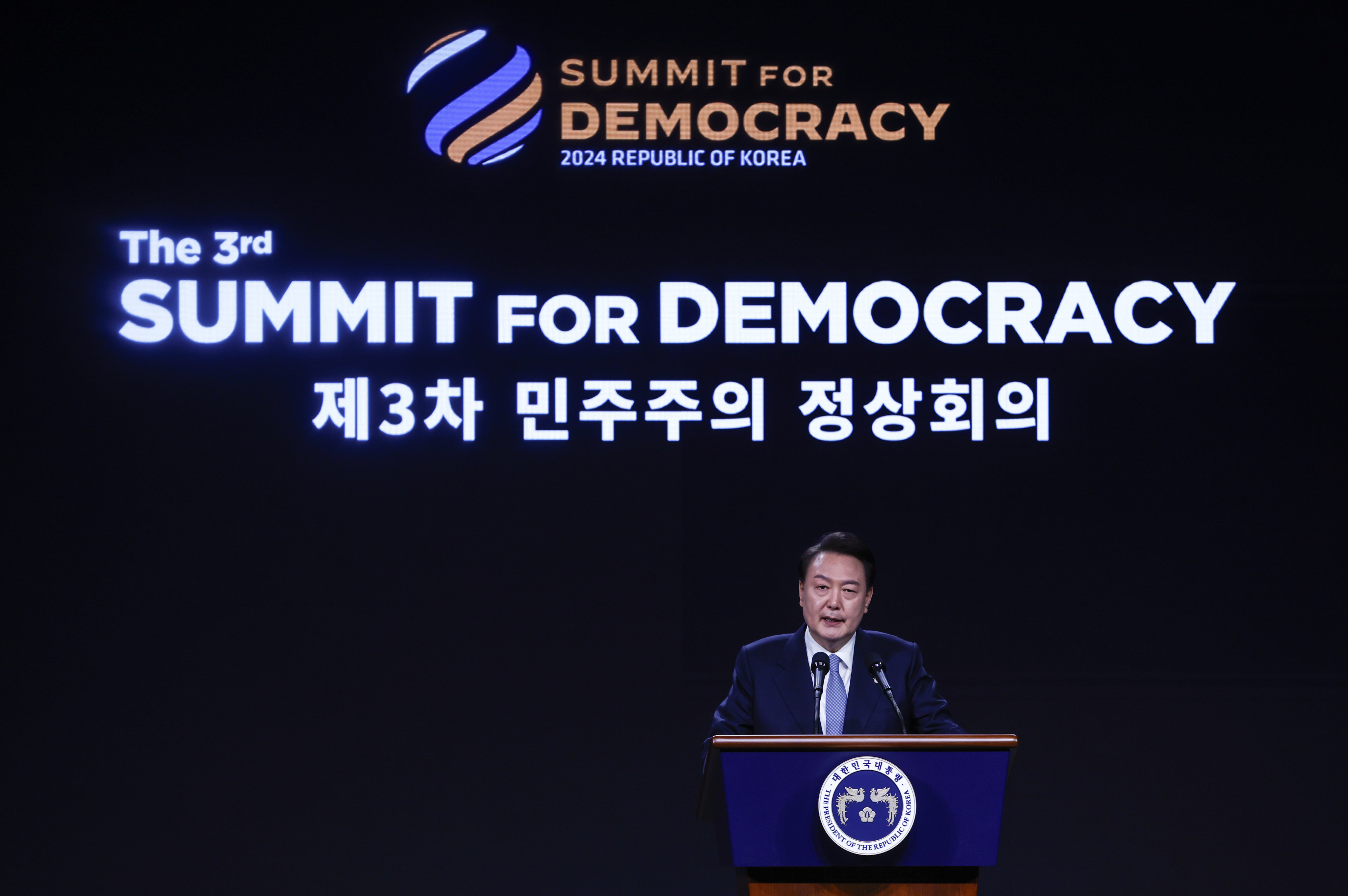 South Korean President Yoon Suk-yeol delivers remarks at the third Summit for Democracy in Seoul on Monday. Photo: AP