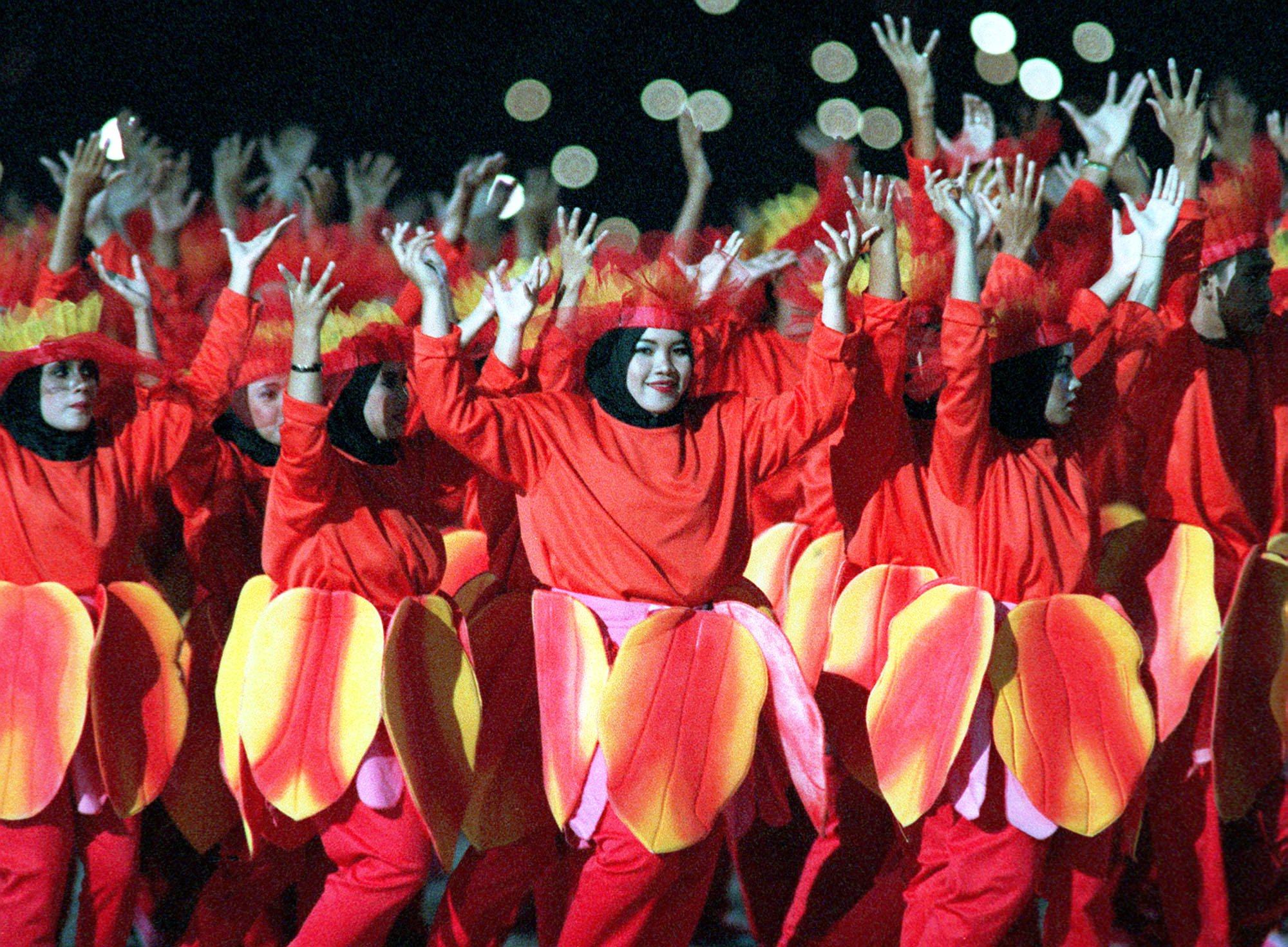 Flower girls performing during the opening ceremony of the 1998 Commonwealth Games in Kuala Lumpur, Malaysia. Photo: AP