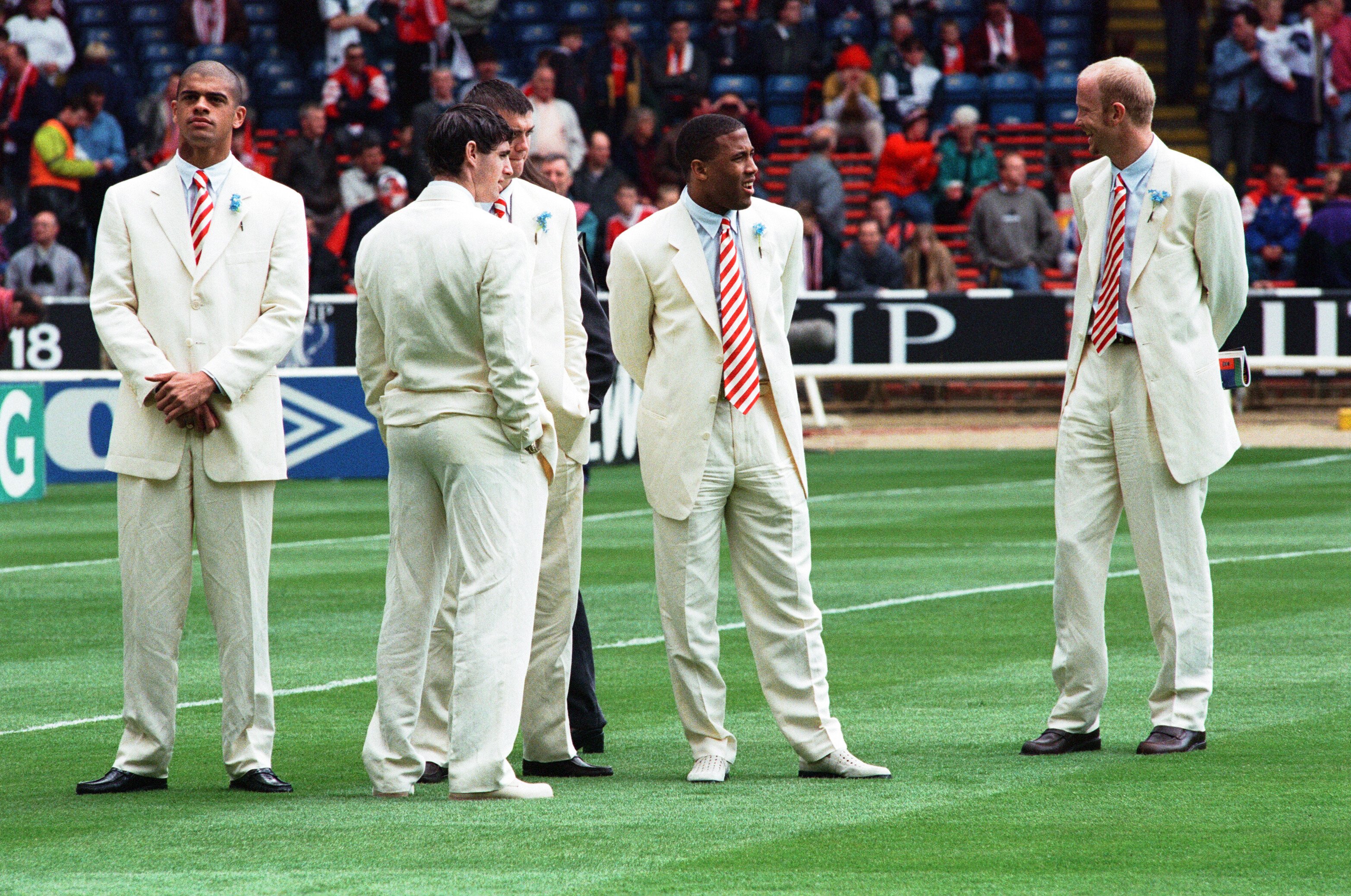Mark Wright (right) and John Barnes with their Liverpool teammates on the pitch at Wembley before the start of the 1996 FA Cup final against Manchester United. Photo: Getty Images