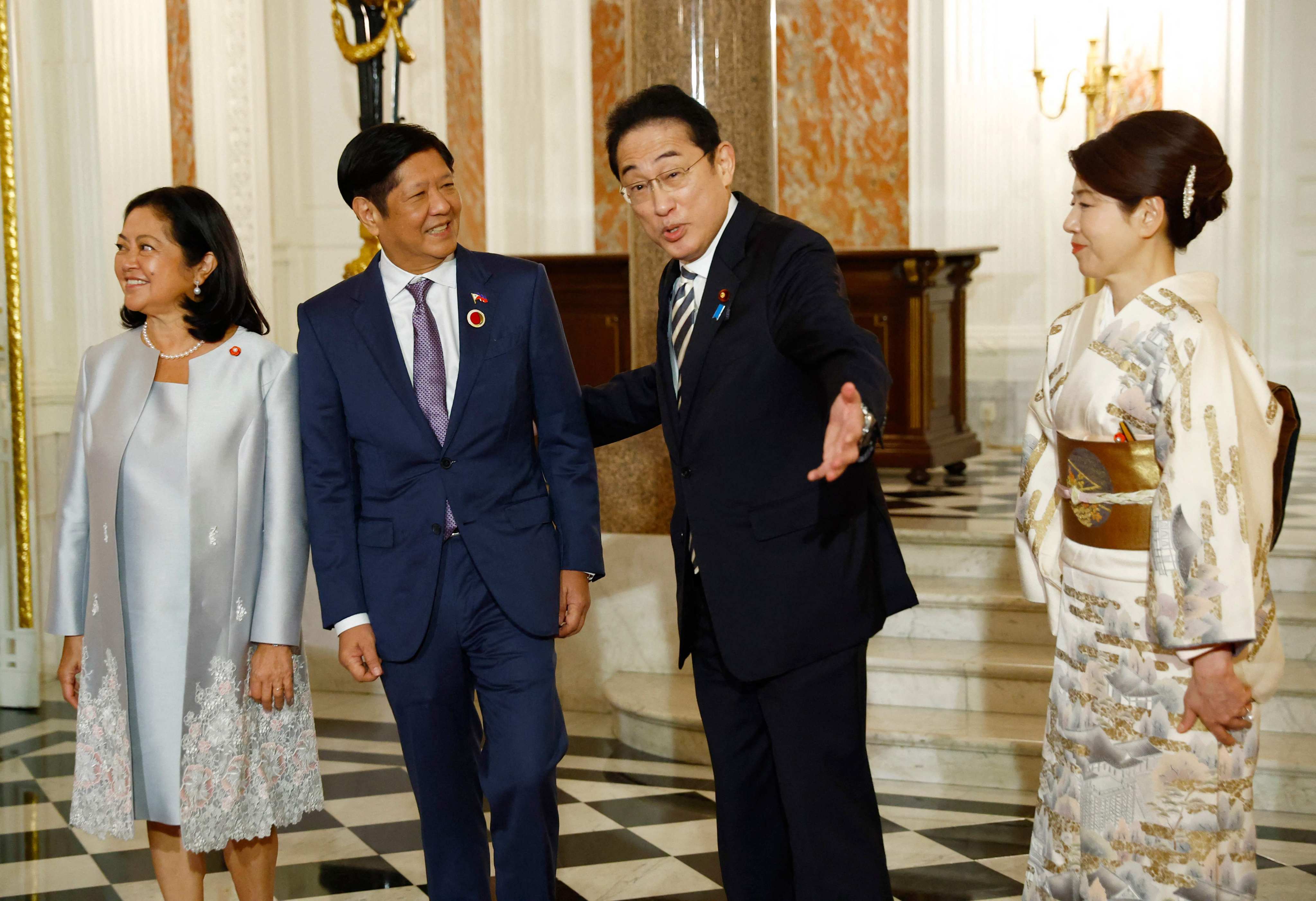 Japan’s Prime Minister Fumio Kishida (right) welcome Philippine President Ferdinand Marcos Jnr (left) at the Tokyo’s Akasaka Palace state guest house in December. Photo: AFP