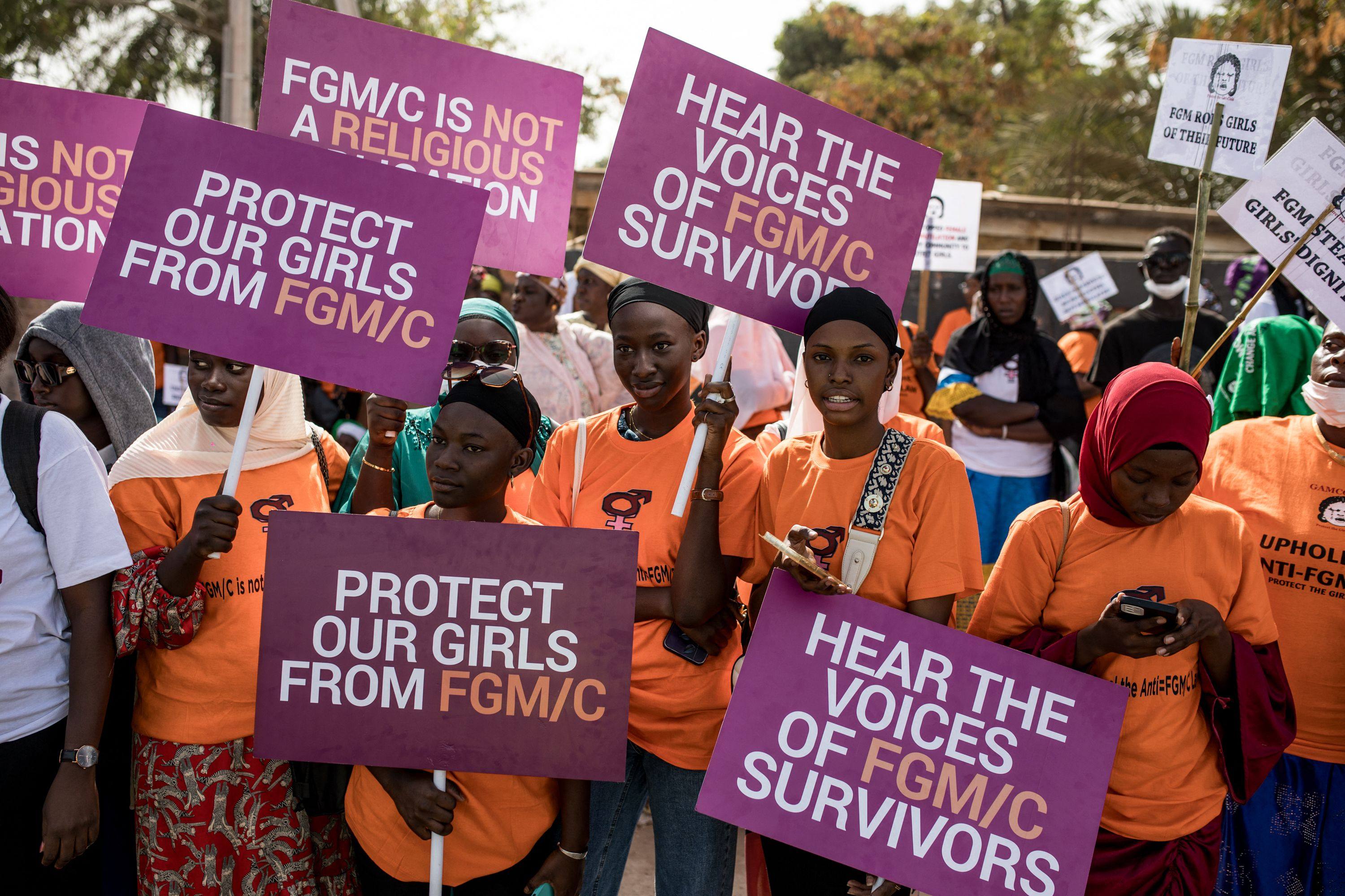 Protesters against female genital mutilation, outside the National Assembly in Banjul, Gambia. Photo: AFP