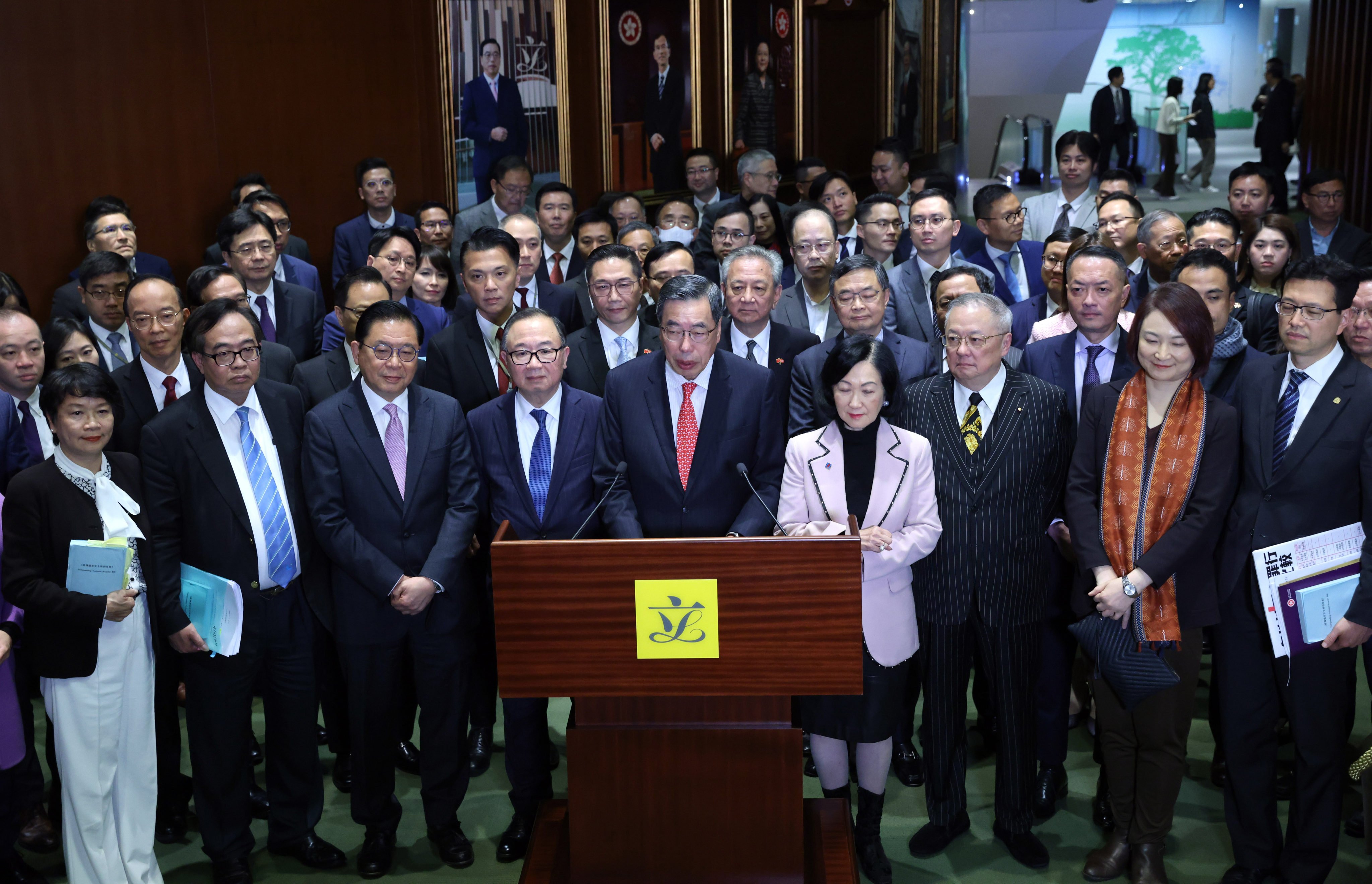 Andrew Leung, the Legco president, and council members after the legislature passed the city’s Article 23 bill. Photo: Yik Yeung-man