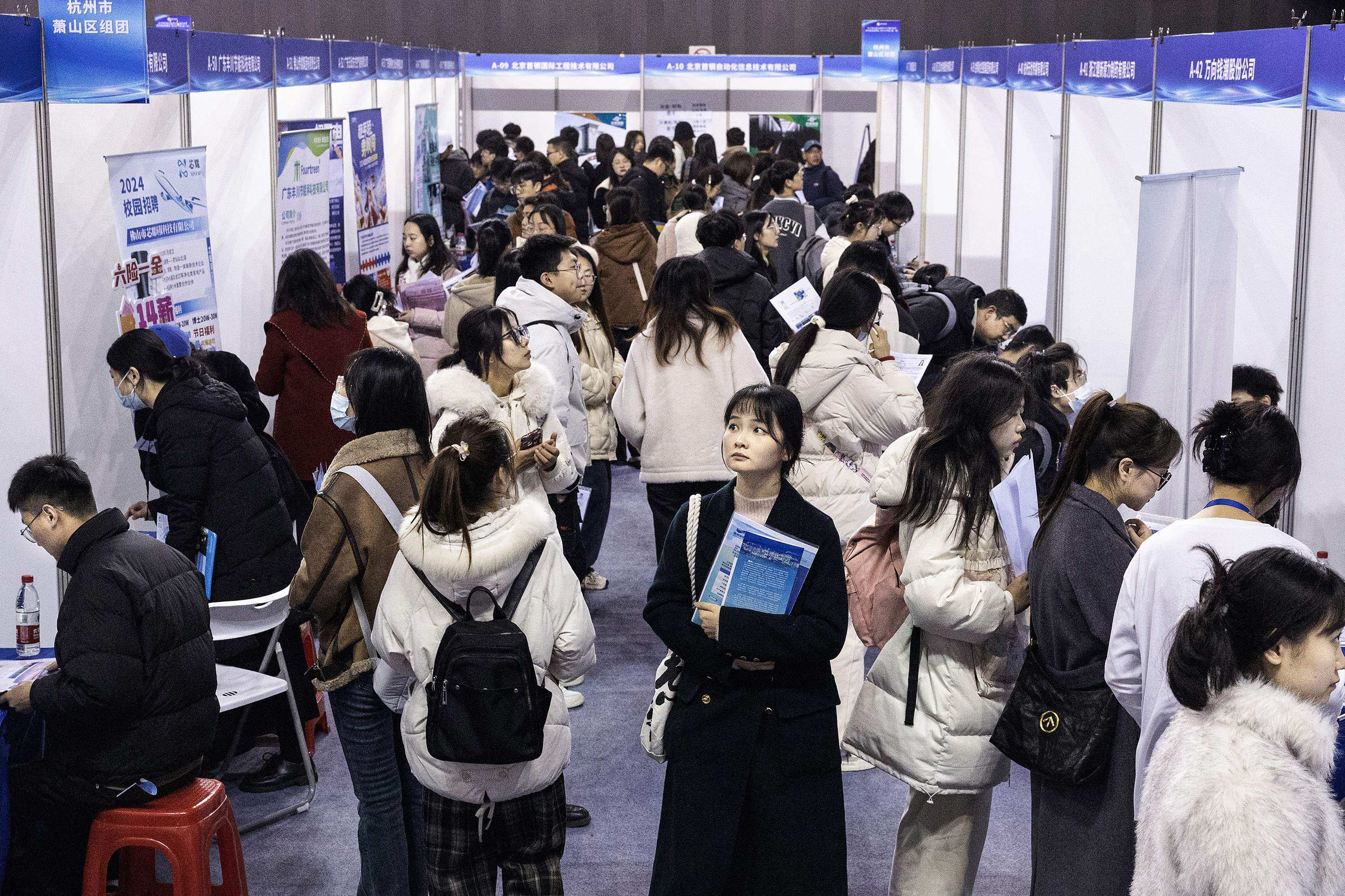 University students attend a job fair in Wuhan, in central China’s Hubei province, on March 6. Photo: AFP