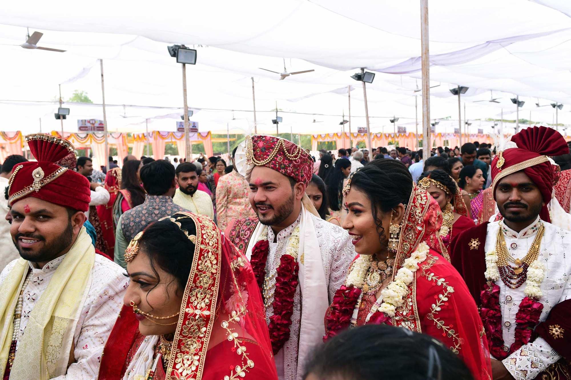 Hindu couples take part in a mass marriage ceremony on the outskirts of Ahmedabad on February 27. Late marriages are among the factors affecting India’s falling fertility rates. Photo: AFP