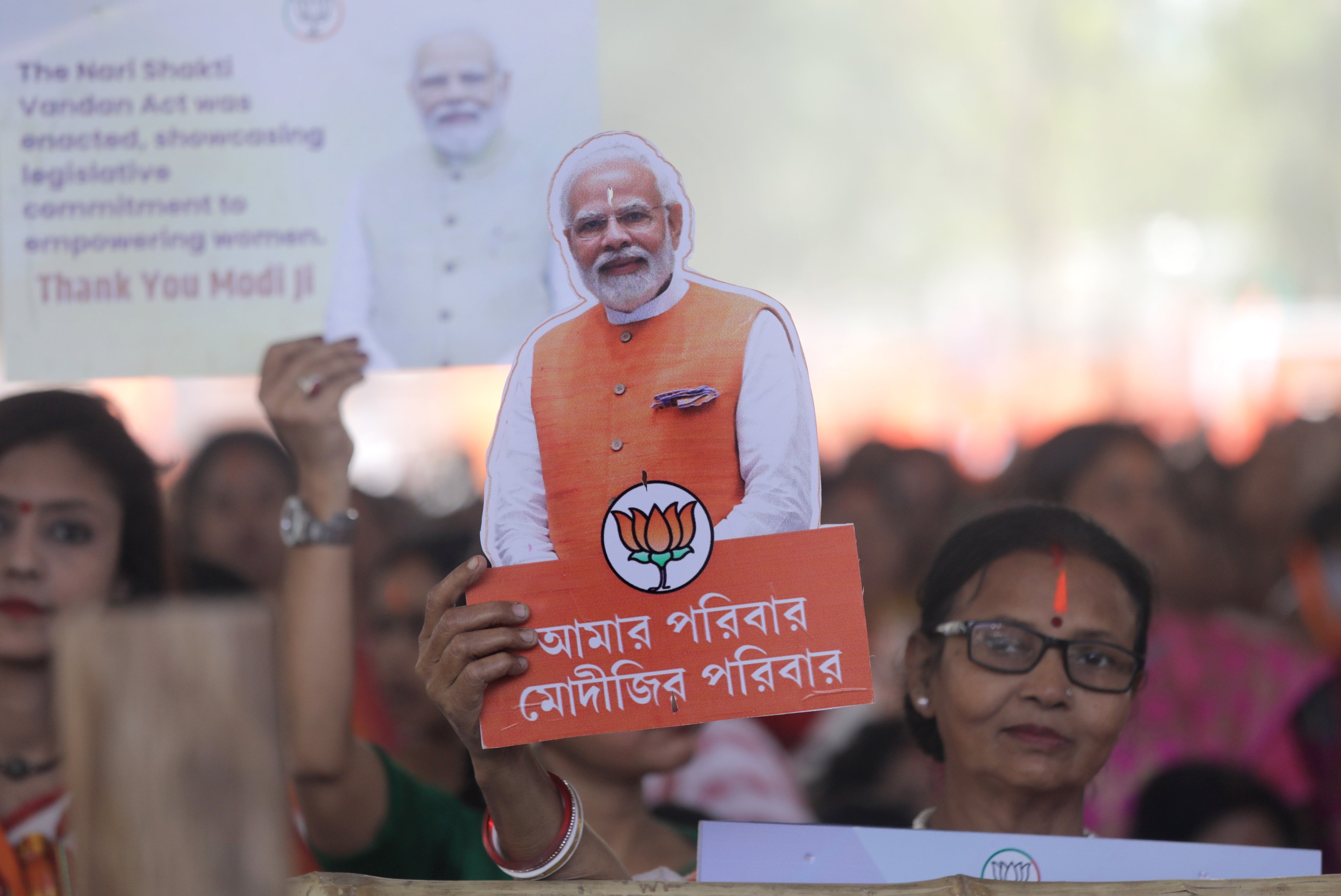 A Bharatiya Janata Party supporter holds up a cutout of Indian Prime Minister Narendra Modi in Kolkata on March 6. Photo: EPA-EFE