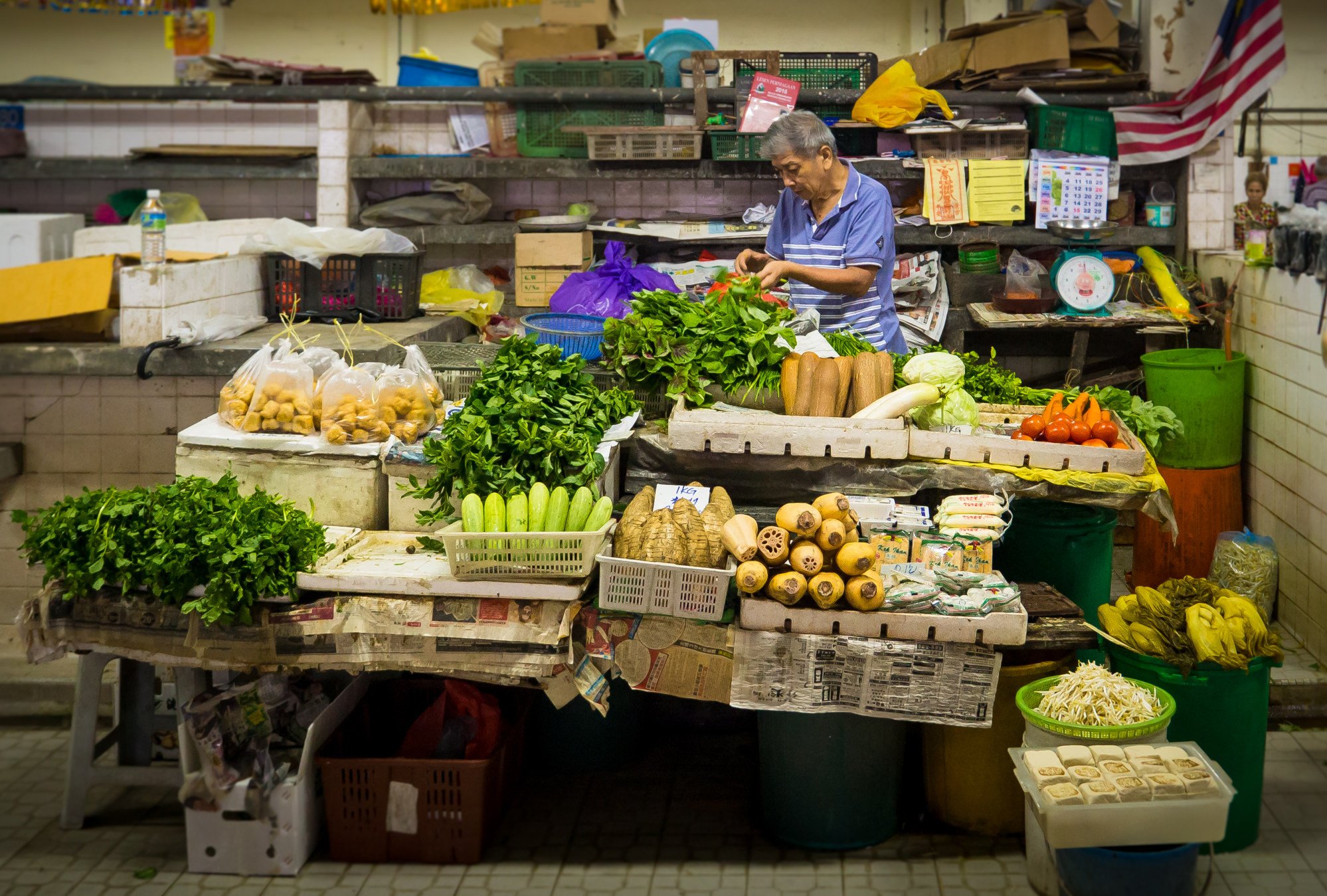 A vendor sells vegetables and fruits in Pahang, Malaysia. Photo: Shutterstock