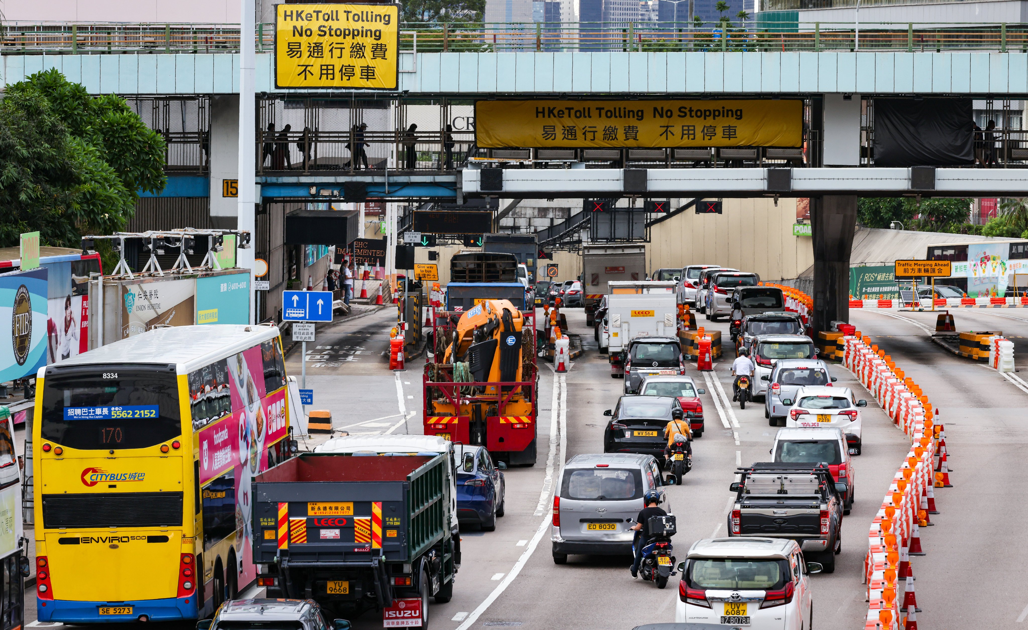 Vehicles enter the Cross-Harbour Tunnel. The launch of HKeToll last year was marred by several issues, including delays and failed deliveries of tags. Photo: Yik Yeung-man