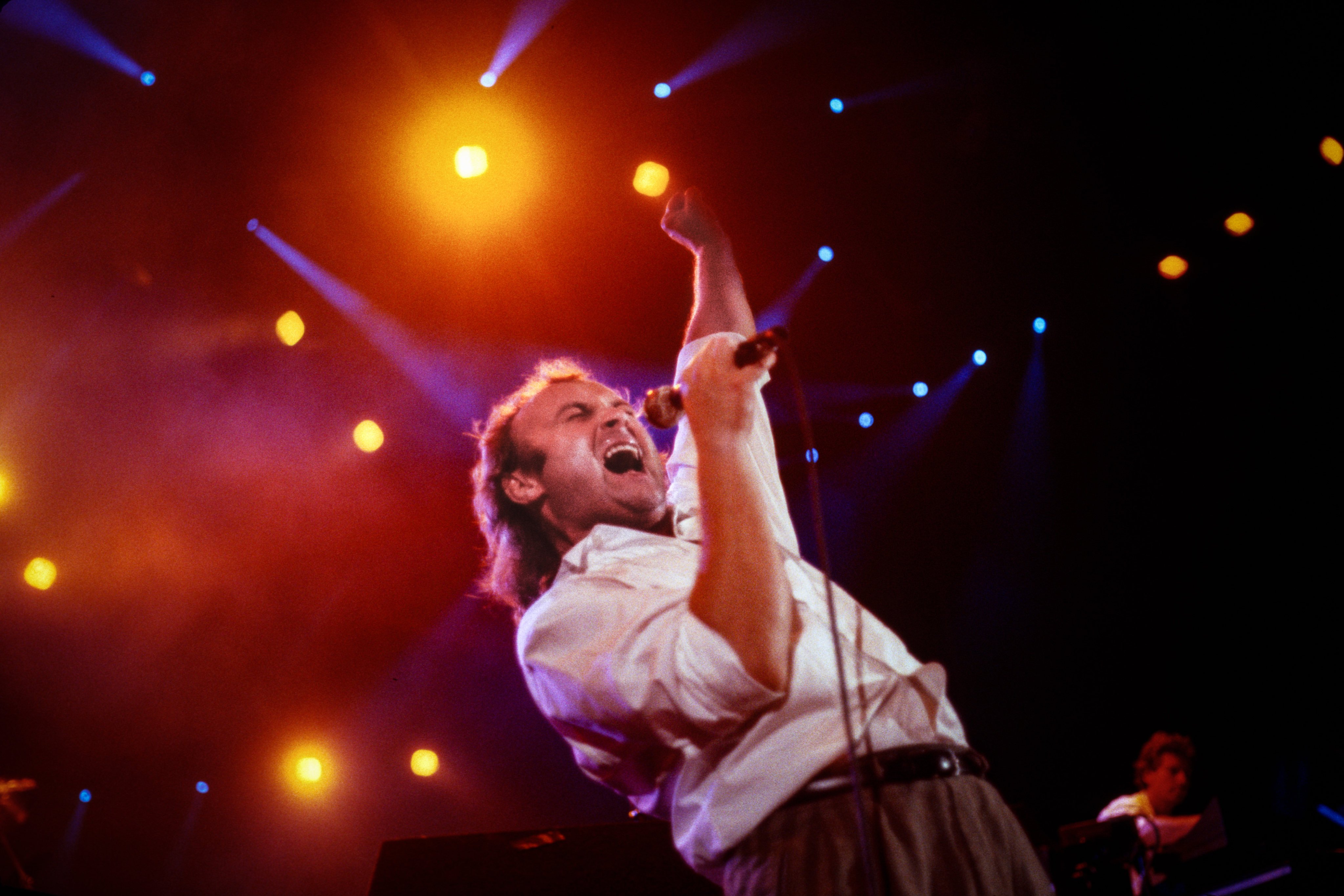 Phil Collins of the band Genesis performs in support of their album The Invisible Touch at The Brendan Byrne Arena (Meadowlands Arena) in East Rutherford, New Jersey, US, on May 30, 1987. Photo: Getty Images